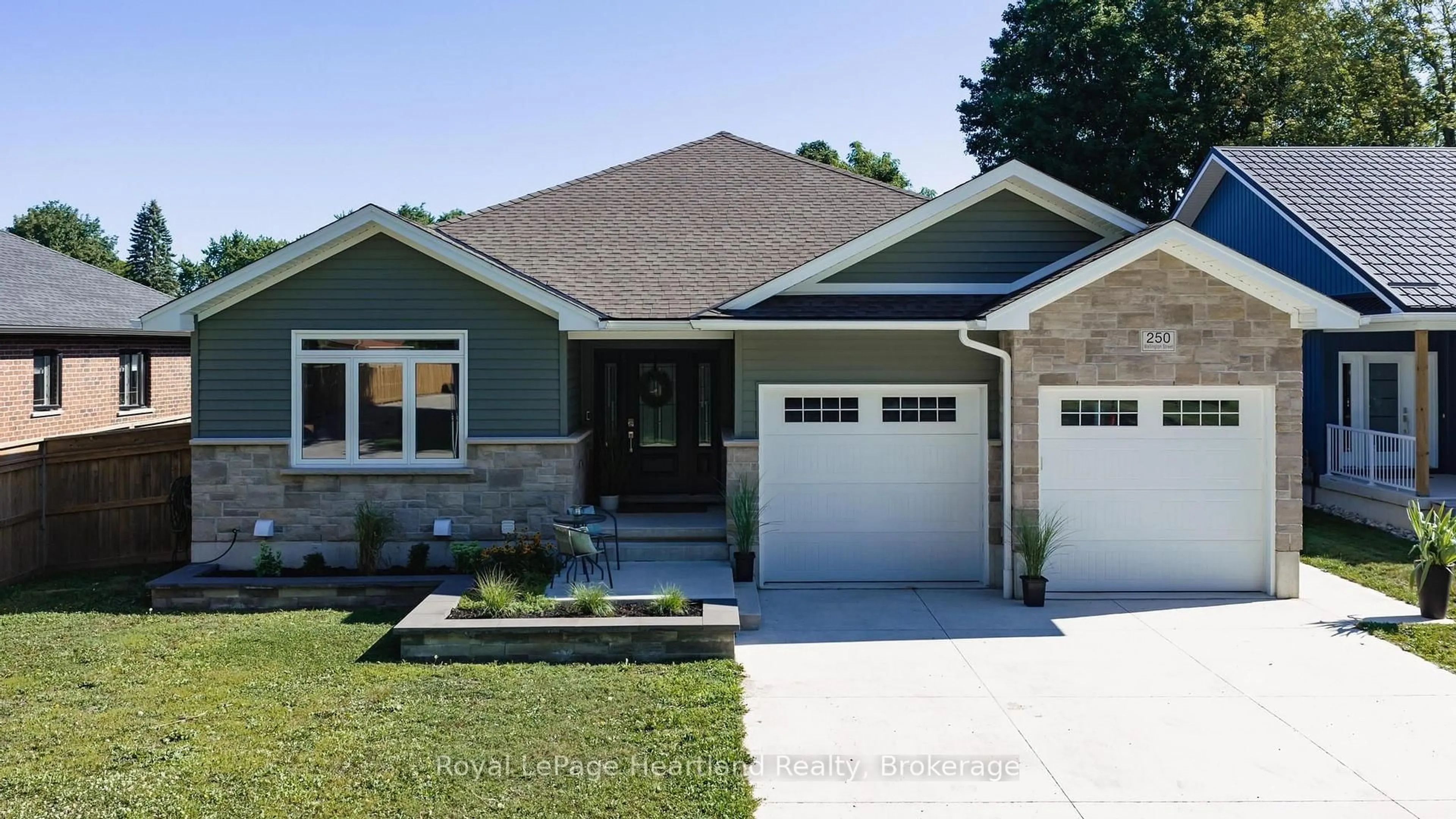 Home with brick exterior material, street for 250 Wellington St, North Huron Ontario N0M 1H0
