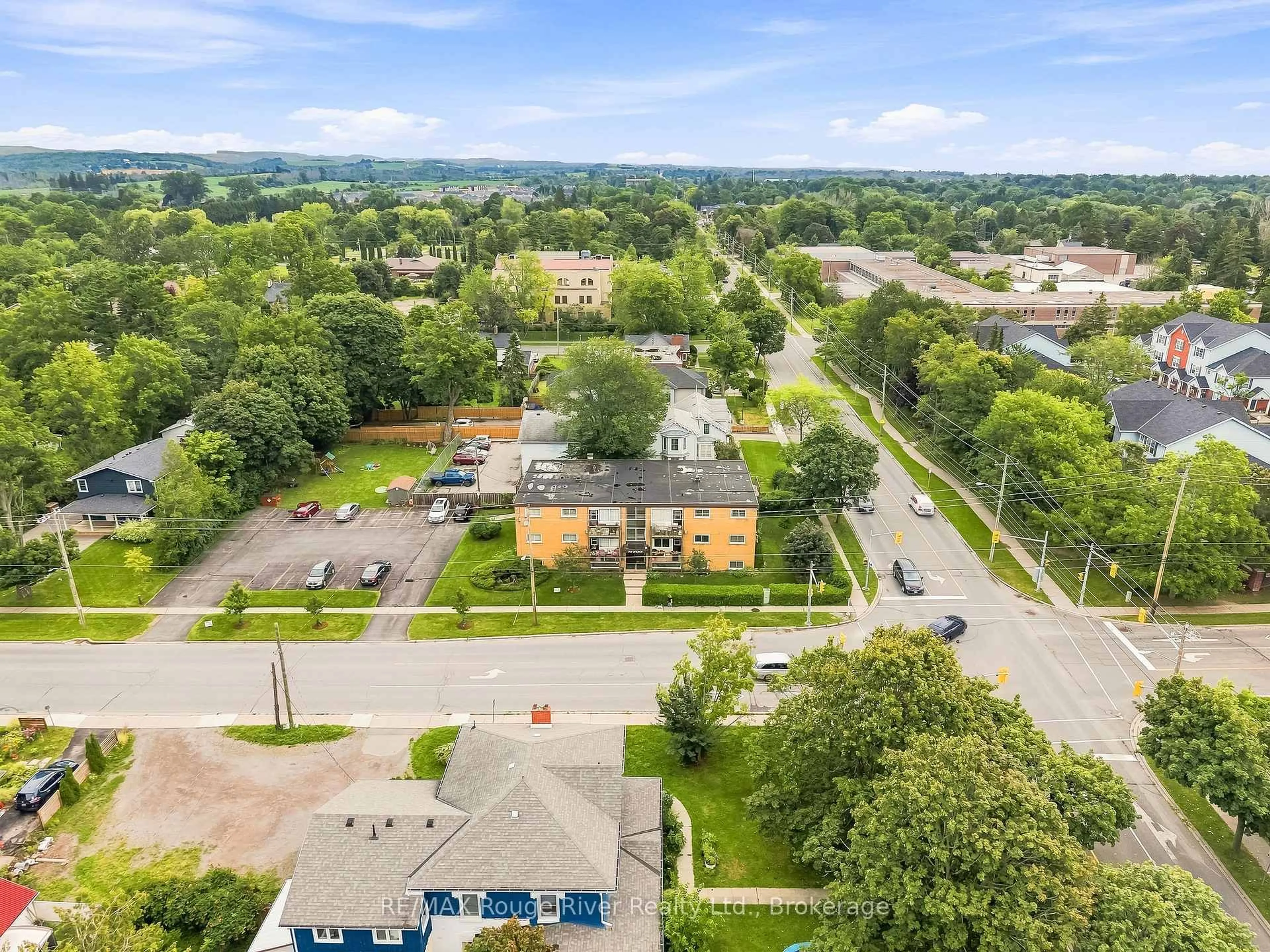 A pic from outside/outdoor area/front of a property/back of a property/a pic from drone, unknown for 242 D'arcy St #3, Cobourg Ontario K9A 4A3