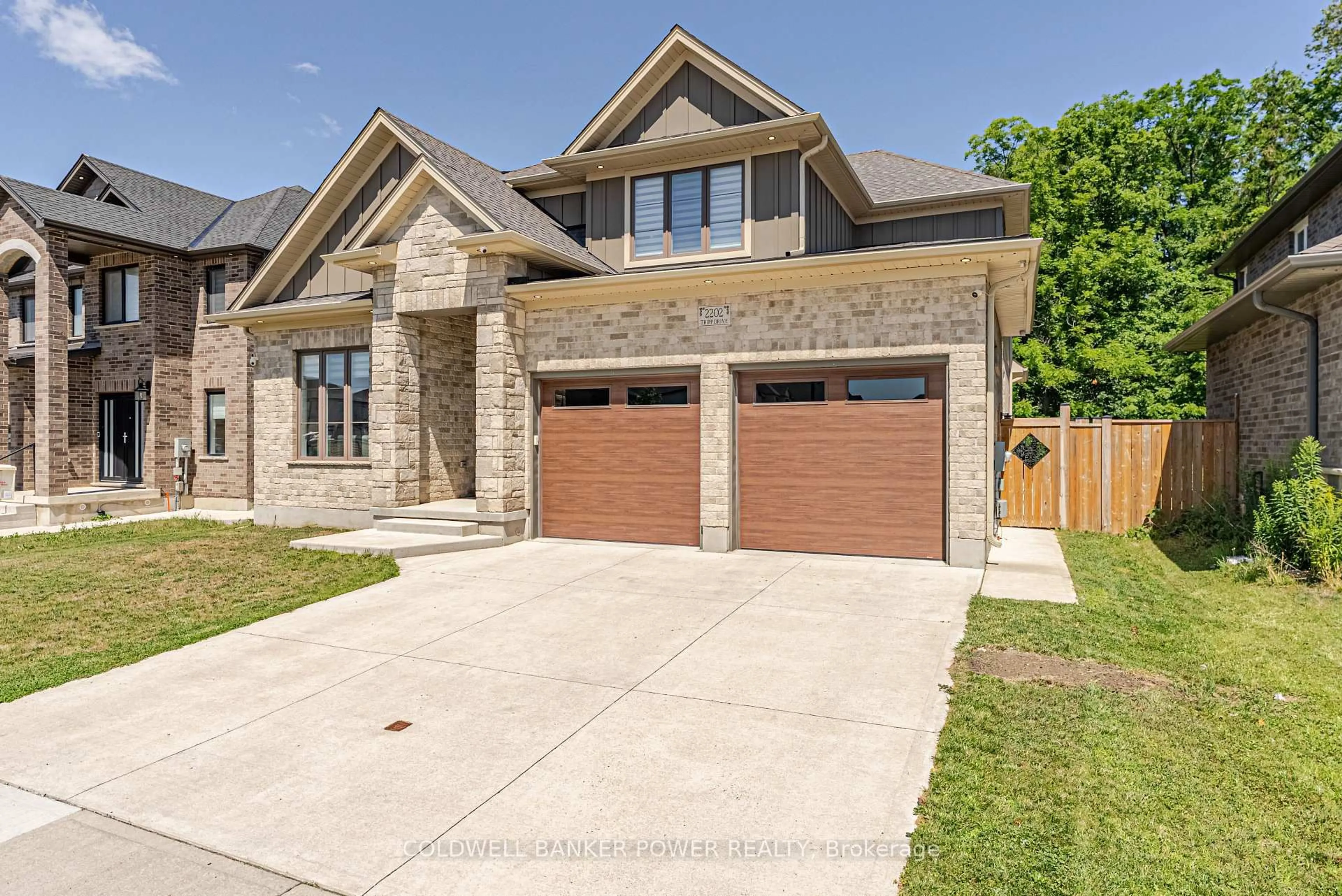 Home with brick exterior material, street for 2202 Tripp Dr, London South Ontario N6P 0H4