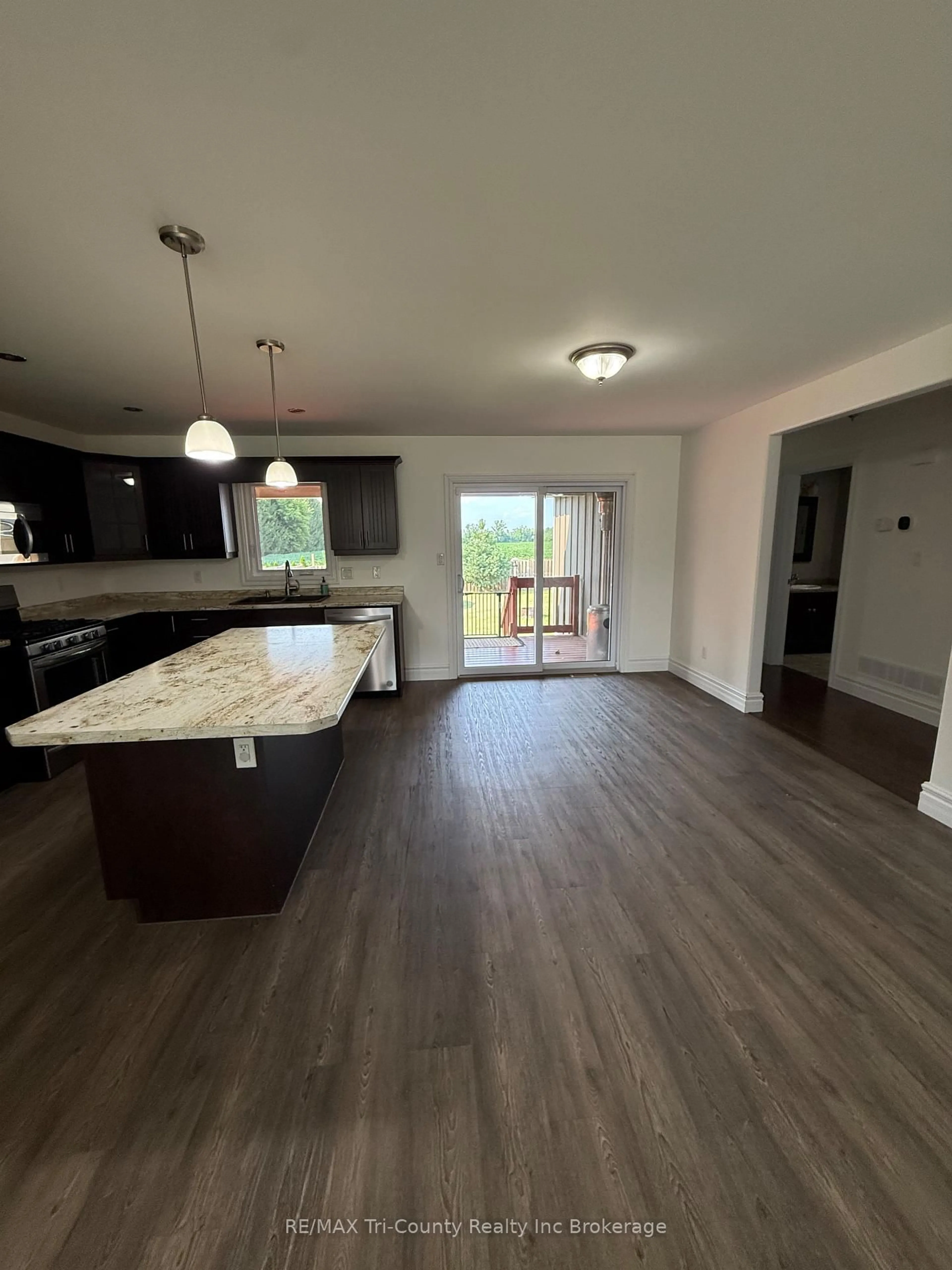 Open concept kitchen, wood/laminate floor for 56246 Donnelly Dr, Bayham Ontario N0J 1Y0