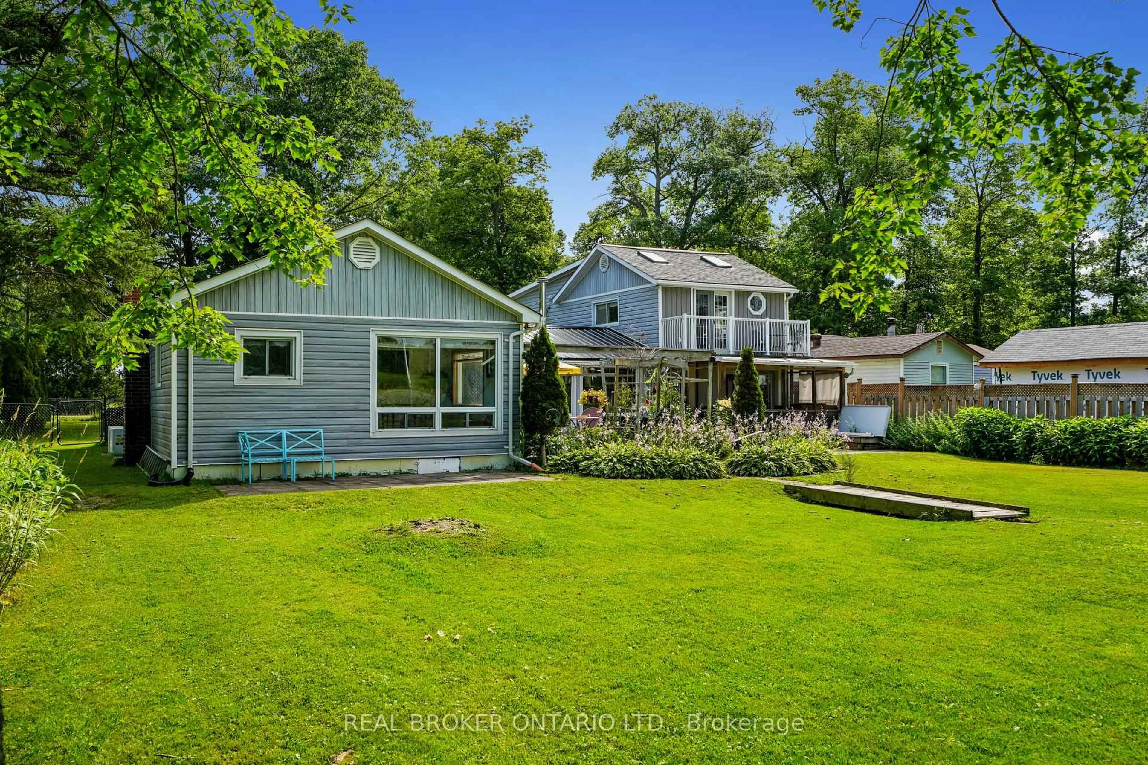A pic from outside/outdoor area/front of a property/back of a property/a pic from drone, water/lake/river/ocean view for 233 River Rd, Trent Hills Ontario K0L 1L0