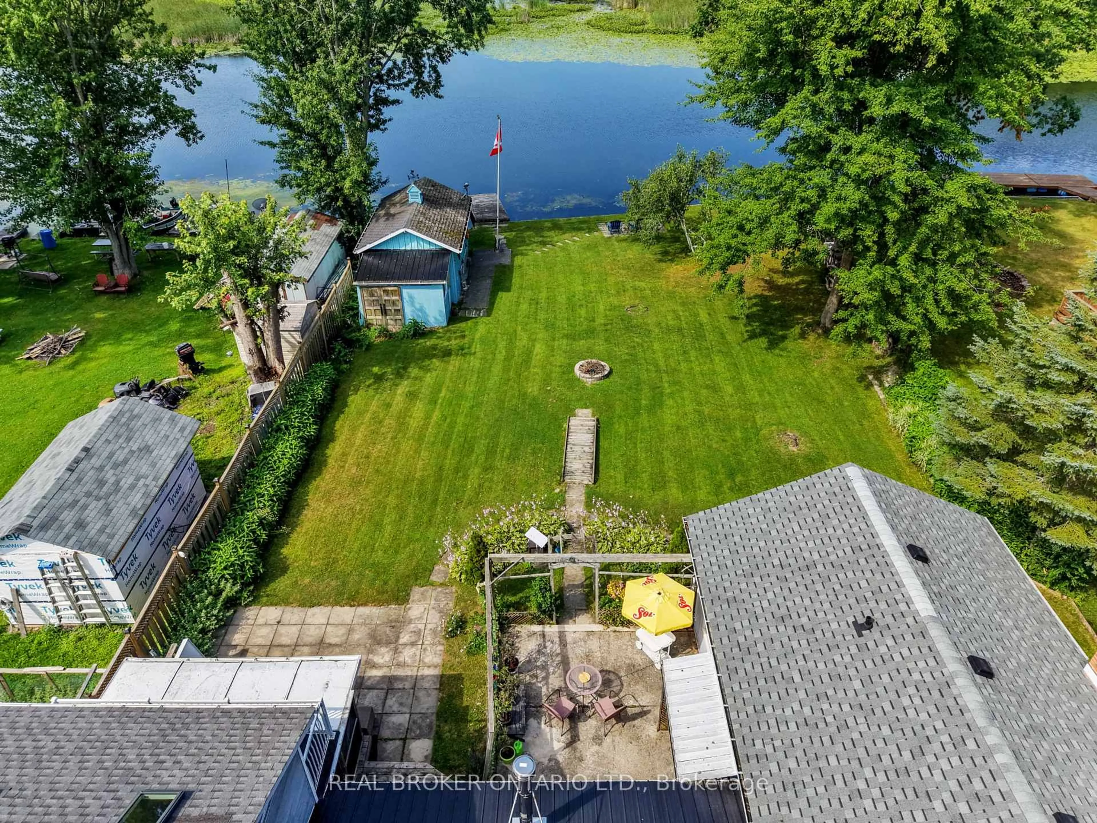A pic from outside/outdoor area/front of a property/back of a property/a pic from drone, water/lake/river/ocean view for 233 River Rd, Trent Hills Ontario K0L 1L0