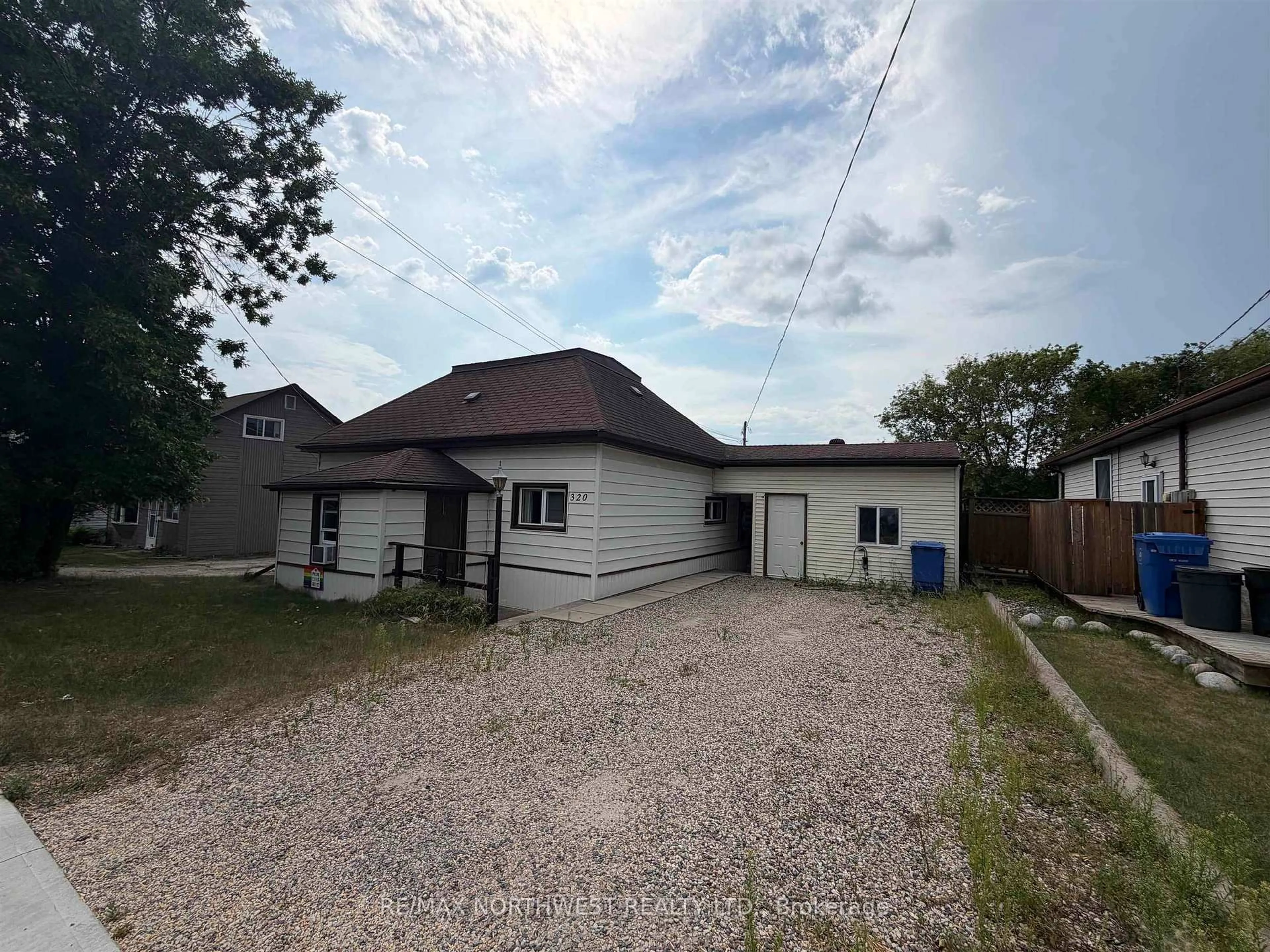 A pic from outside/outdoor area/front of a property/back of a property/a pic from drone, street for 320 Tenth Street, Kenora Ontario P0X 1C0
