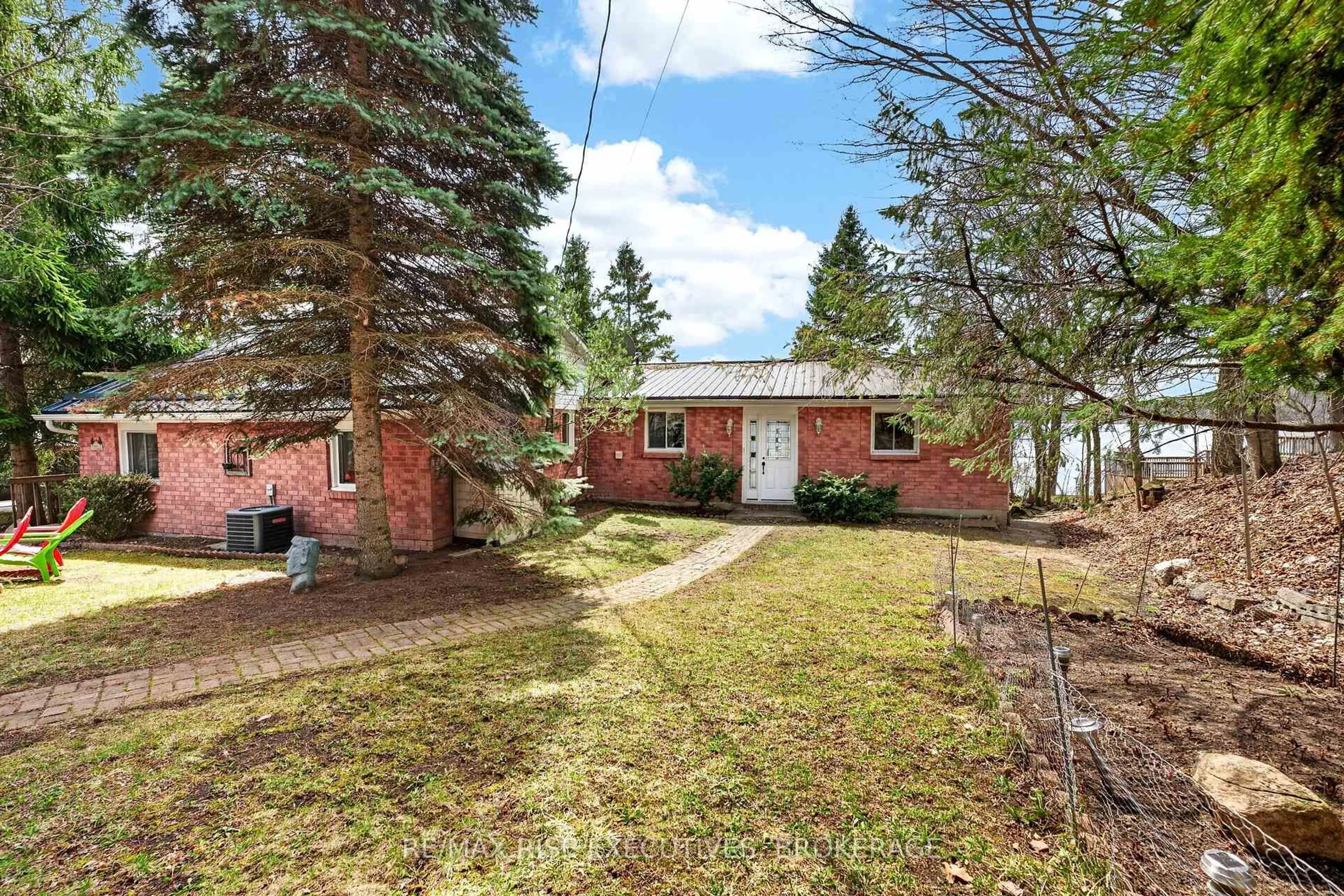 Home with brick exterior material, street for 3481 Buck Point Lane, Inverary Ontario K0H 1X0