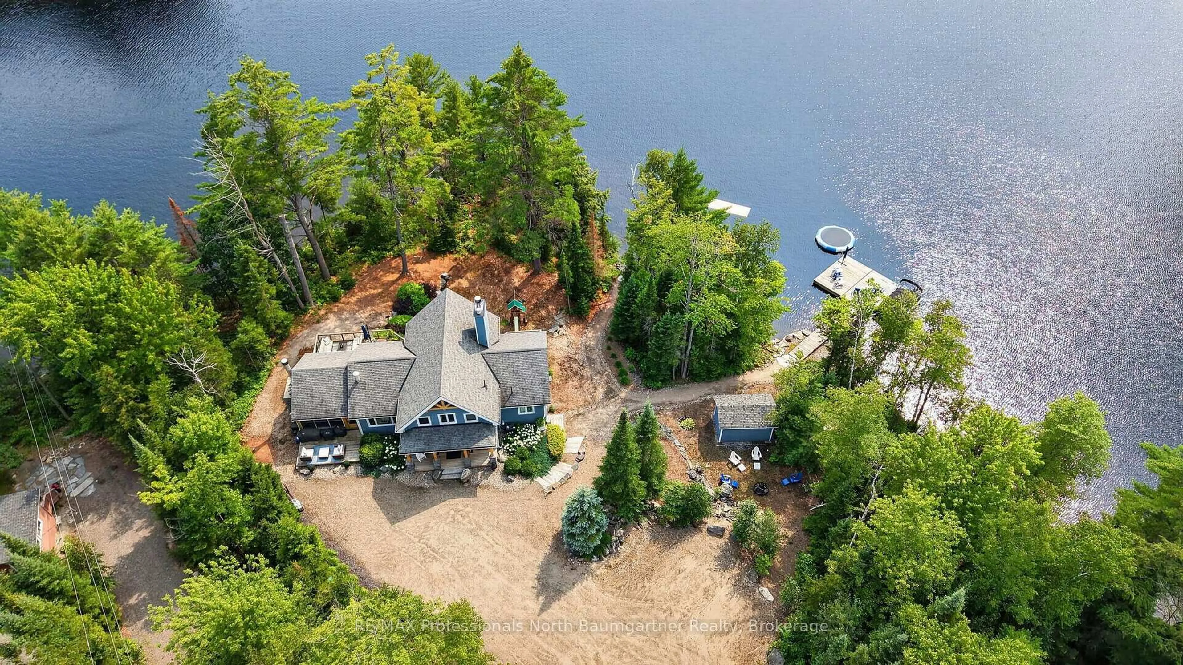 A pic from outside/outdoor area/front of a property/back of a property/a pic from drone, water/lake/river/ocean view for 1038 Chicory Dr, Dysart et al Ontario K0M 1S0