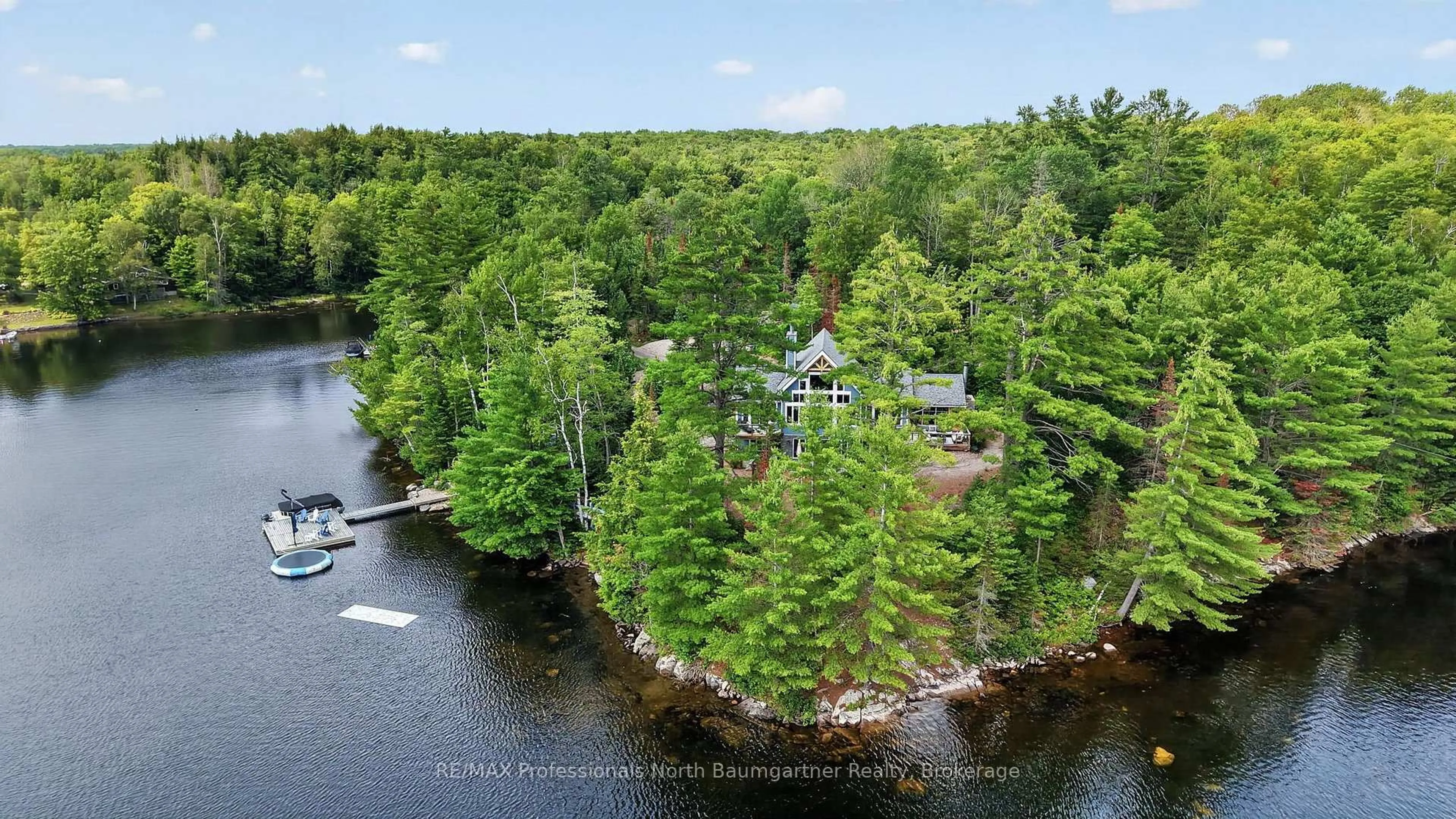 A pic from outside/outdoor area/front of a property/back of a property/a pic from drone, water/lake/river/ocean view for 1038 Chicory Dr, Dysart et al Ontario K0M 1S0