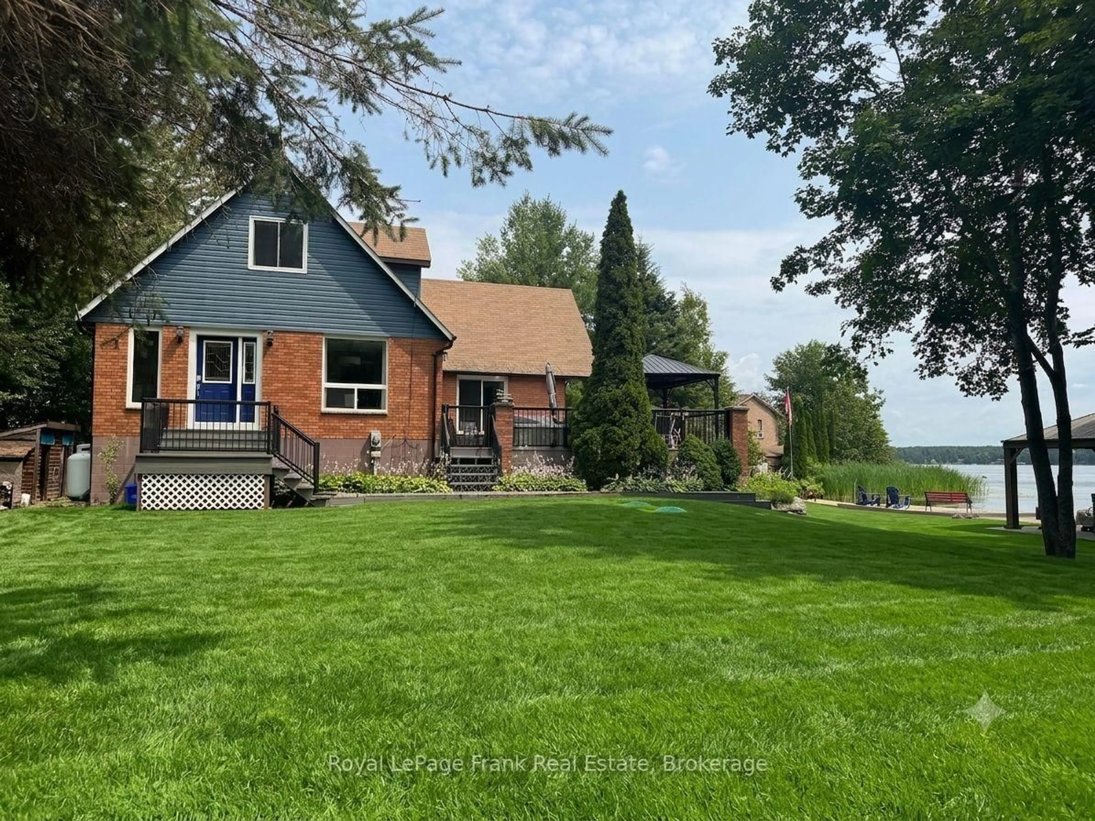 A pic from outside/outdoor area/front of a property/back of a property/a pic from drone, water/lake/river/ocean view for 14 Fire Route 26B, Trent Lakes Ontario K0L 1J0