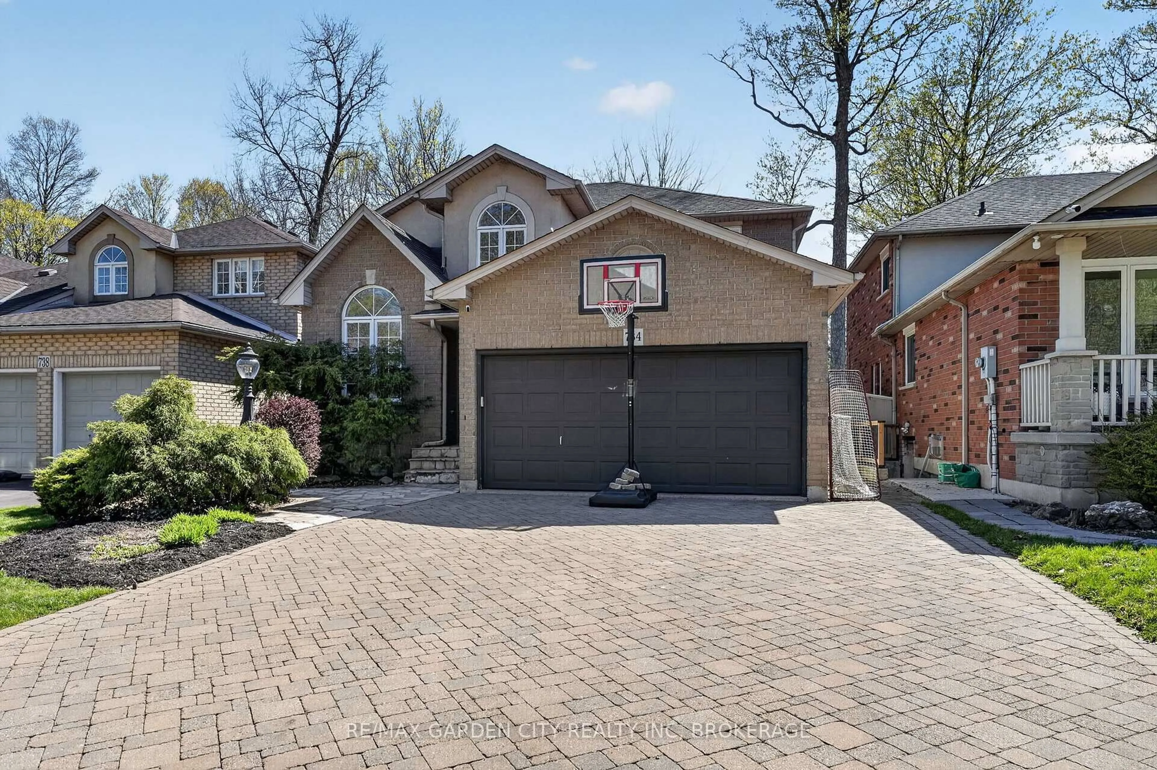 Home with brick exterior material, street for 734 Brigadoon Dr, Hamilton Ontario L9C 7S2