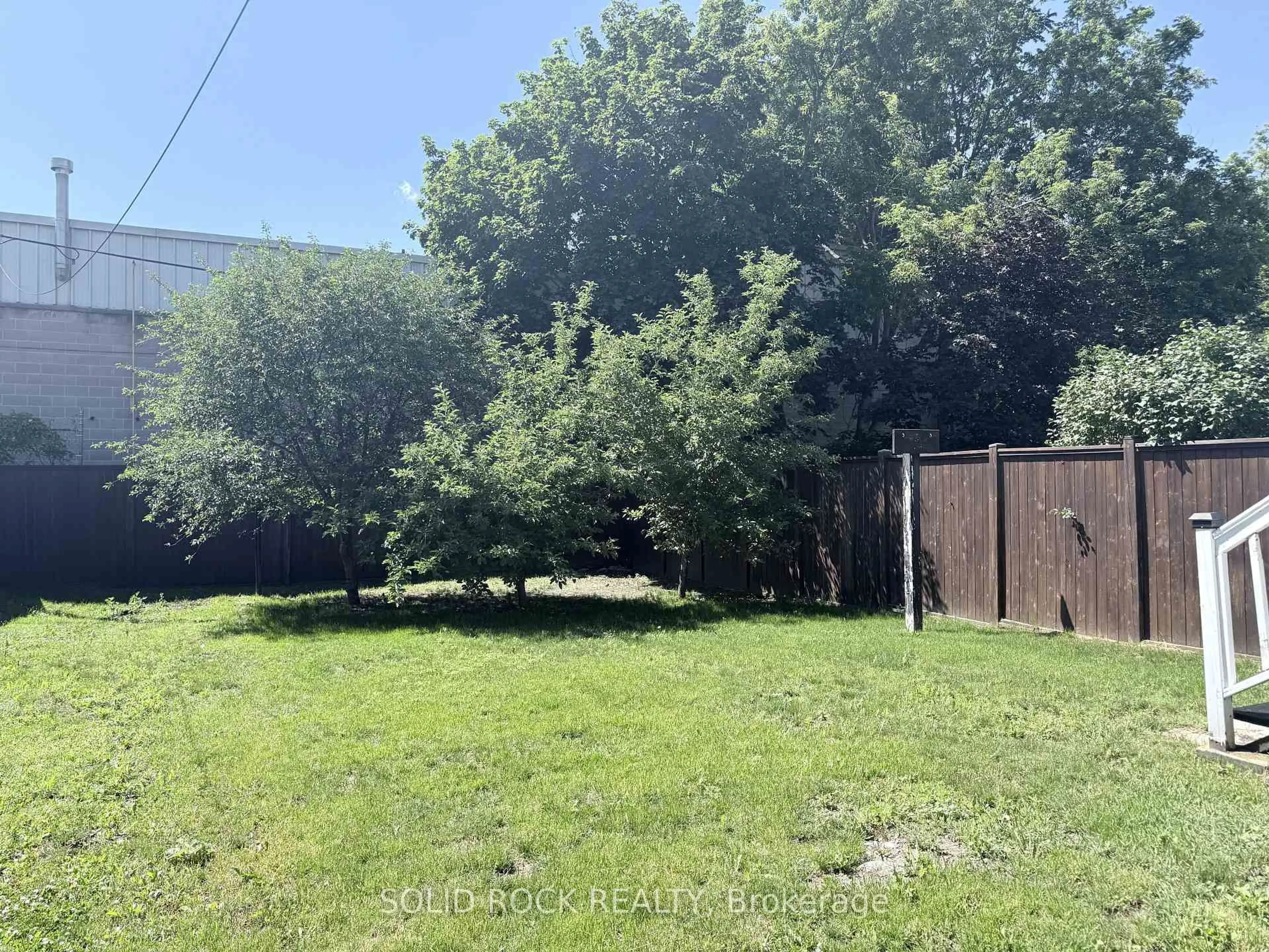 A pic from outside/outdoor area/front of a property/back of a property/a pic from drone, forest/trees view for 513 Romaine St, Peterborough Ontario K9J 2C8