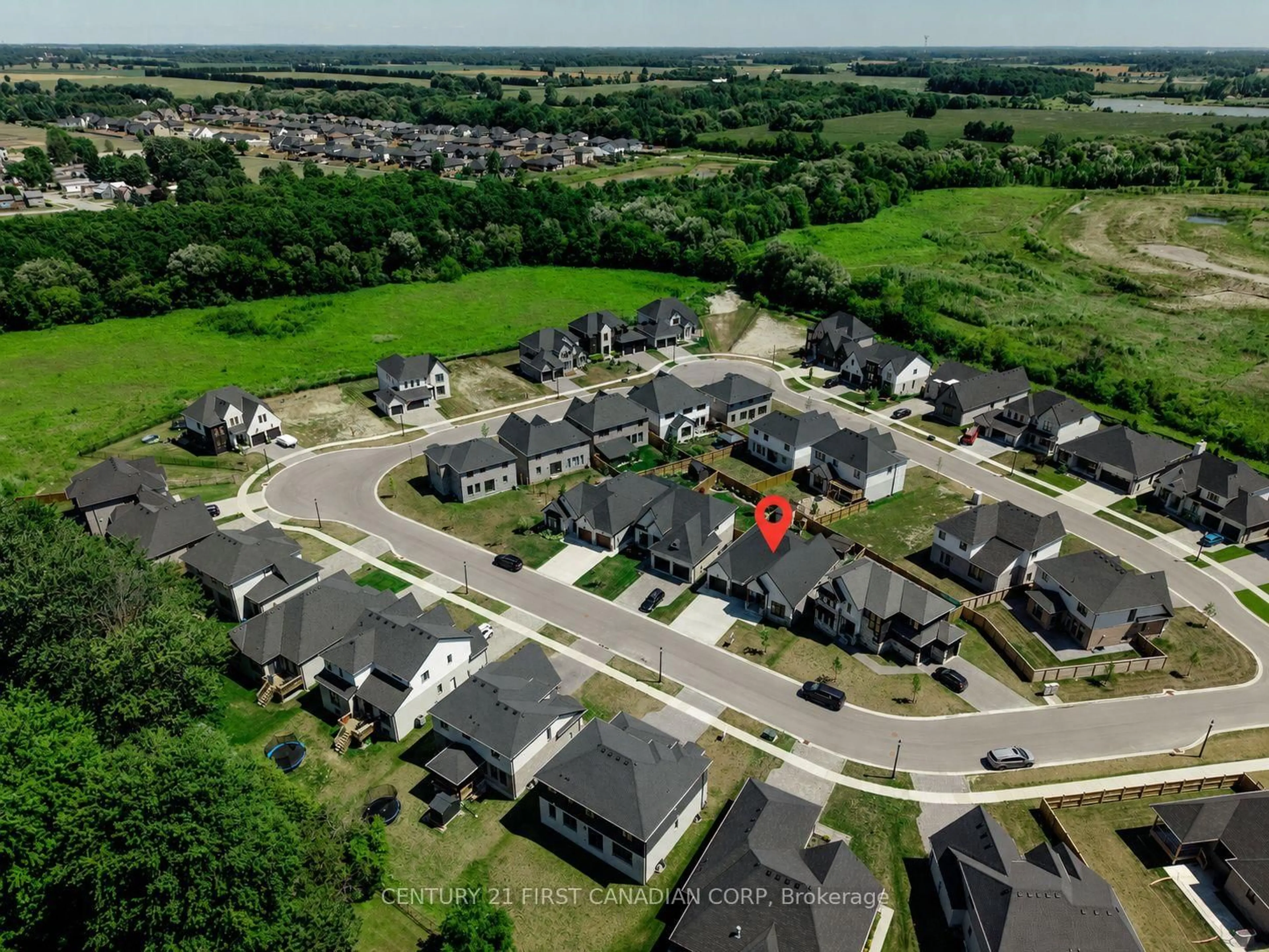 A pic from outside/outdoor area/front of a property/back of a property/a pic from drone, street for 126 Aspen Circ, Thames Centre Ontario N0M 2P0