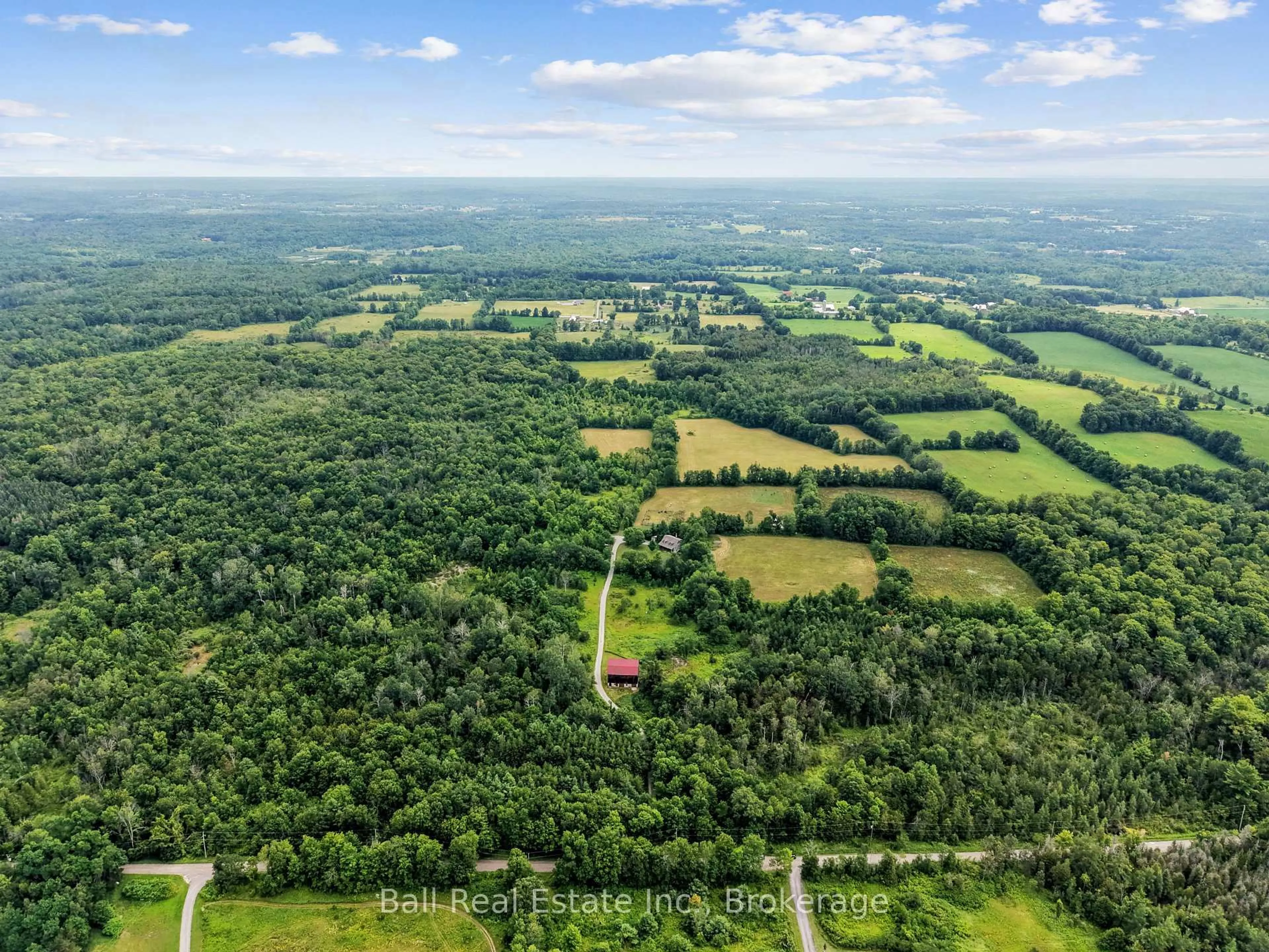 A pic from outside/outdoor area/front of a property/back of a property/a pic from drone, forest/trees view for 180 Johnston Rd, Madoc Ontario K0K 2K0