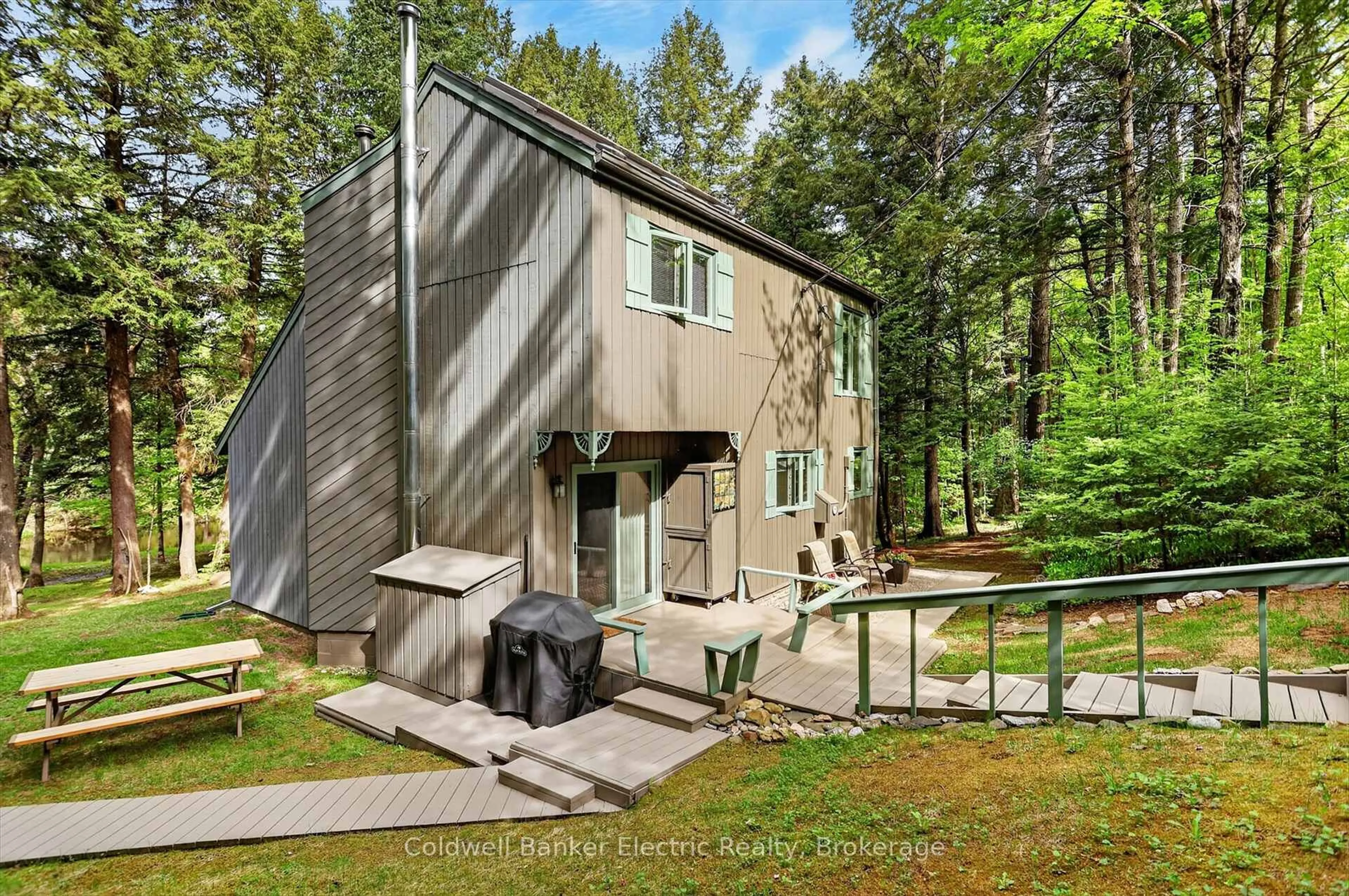 Home with vinyl exterior material, forest/trees view for 44 Lean Dr, North Kawartha Ontario K0L 1A0