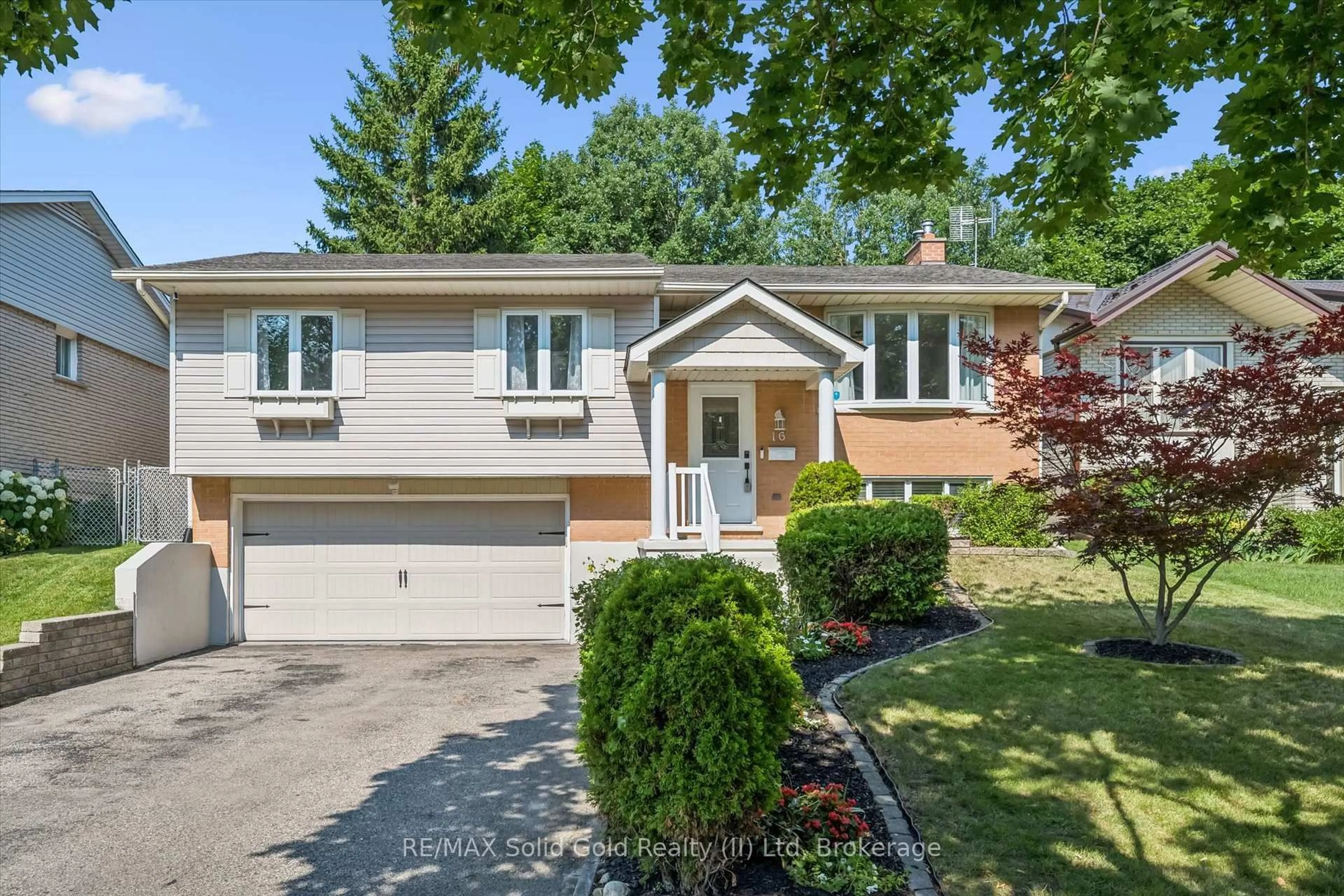 Home with vinyl exterior material, street for 16 Nipigon St, Kitchener Ontario N2B 3M3