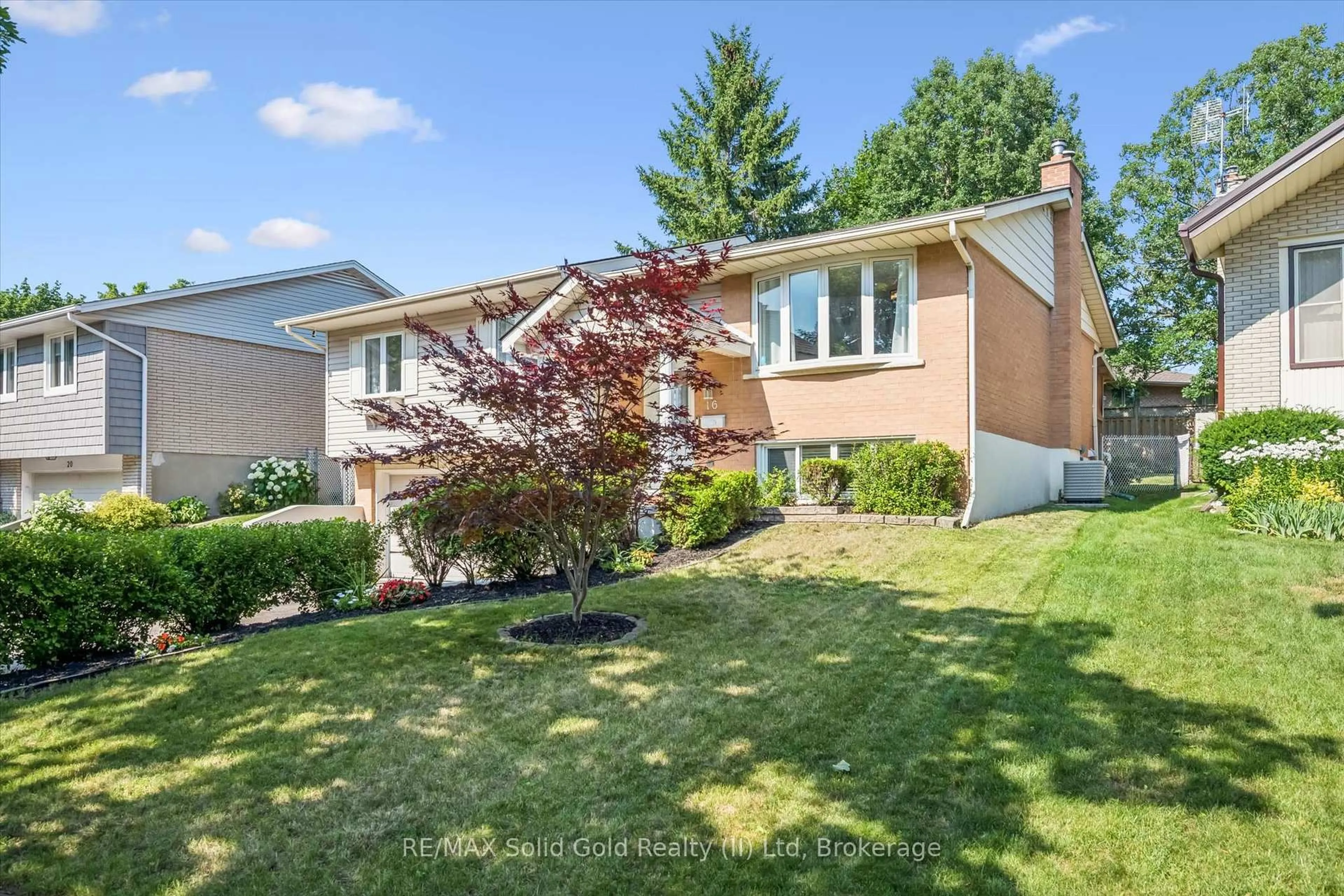 Home with vinyl exterior material, street for 16 Nipigon St, Kitchener Ontario N2B 3M3