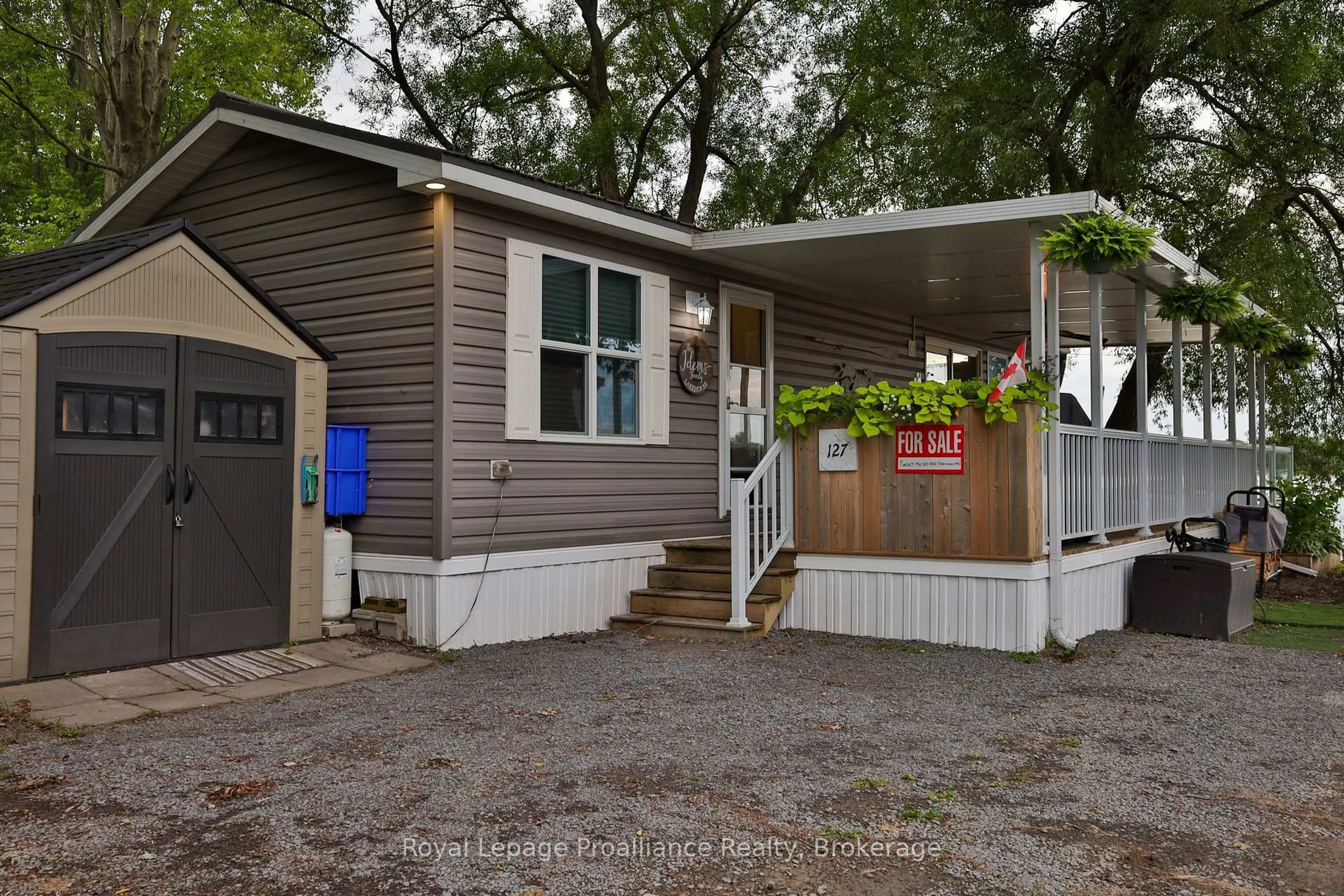 Home with vinyl exterior material, street for 1024 County Road 12 #127, Prince Edward County Ontario K0K 2T0