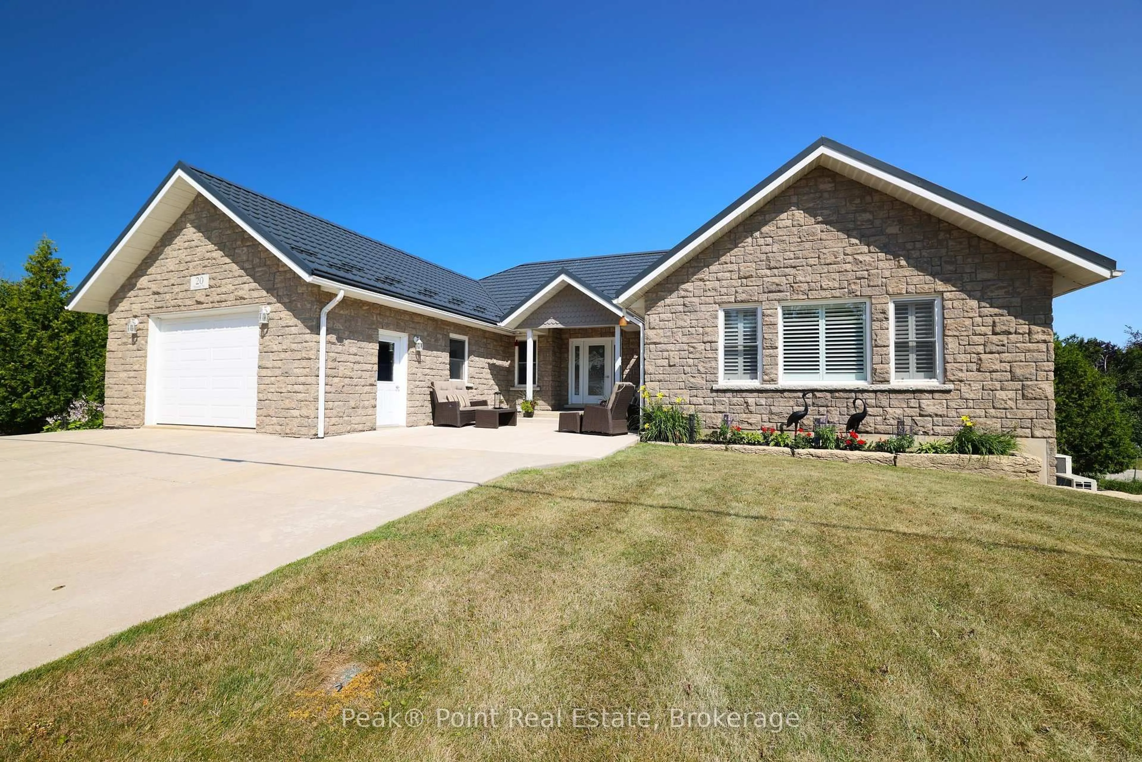Home with brick exterior material, street for 20 Moore St, Northern Bruce Peninsula Ontario N0H 1W0
