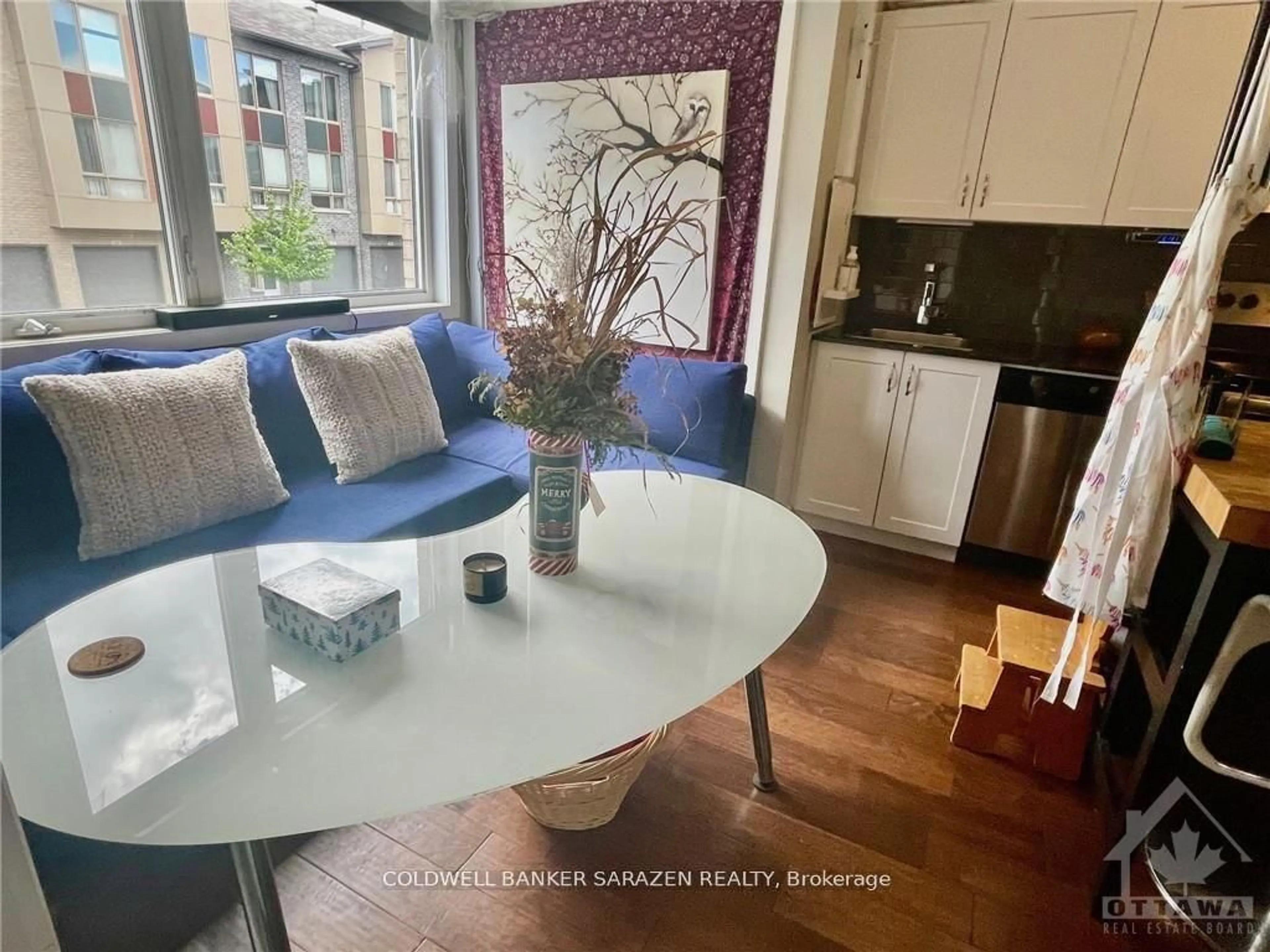 Open concept kitchen, wood/laminate floor for 315 Terravita #107, Ottawa Ontario K1V 8Y9