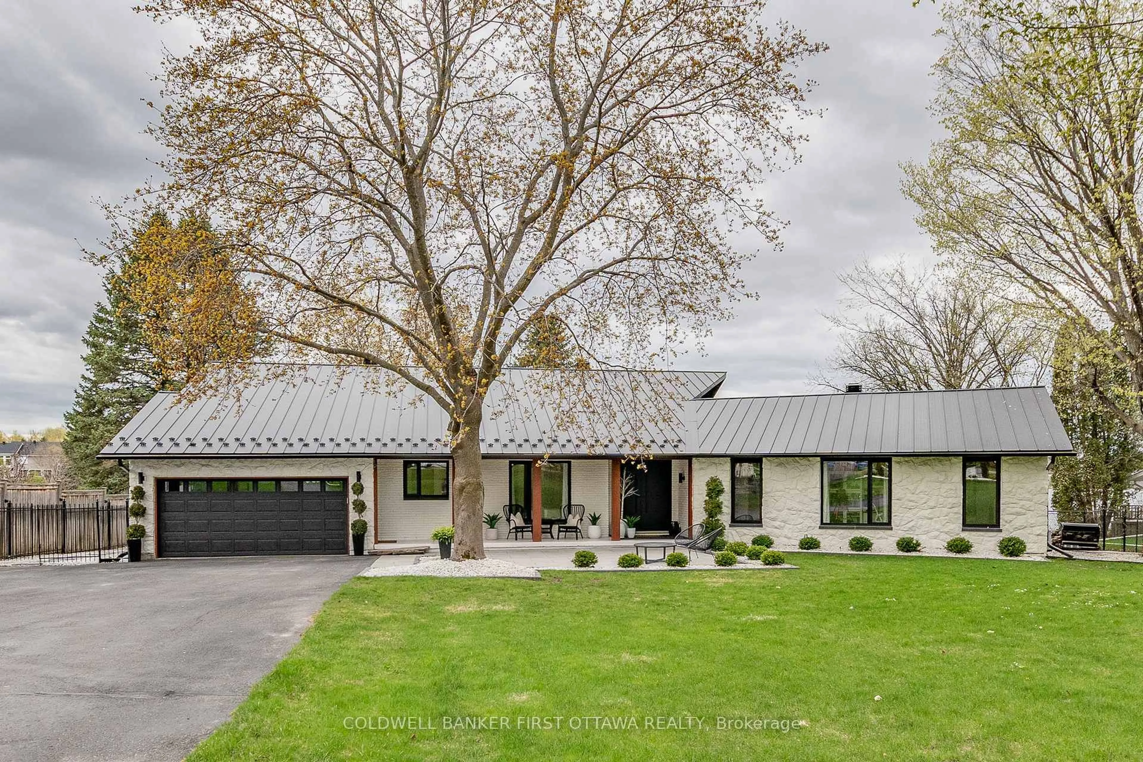 Home with brick exterior material, street for 1060 River Rd, Ottawa Ontario K4M 1B4