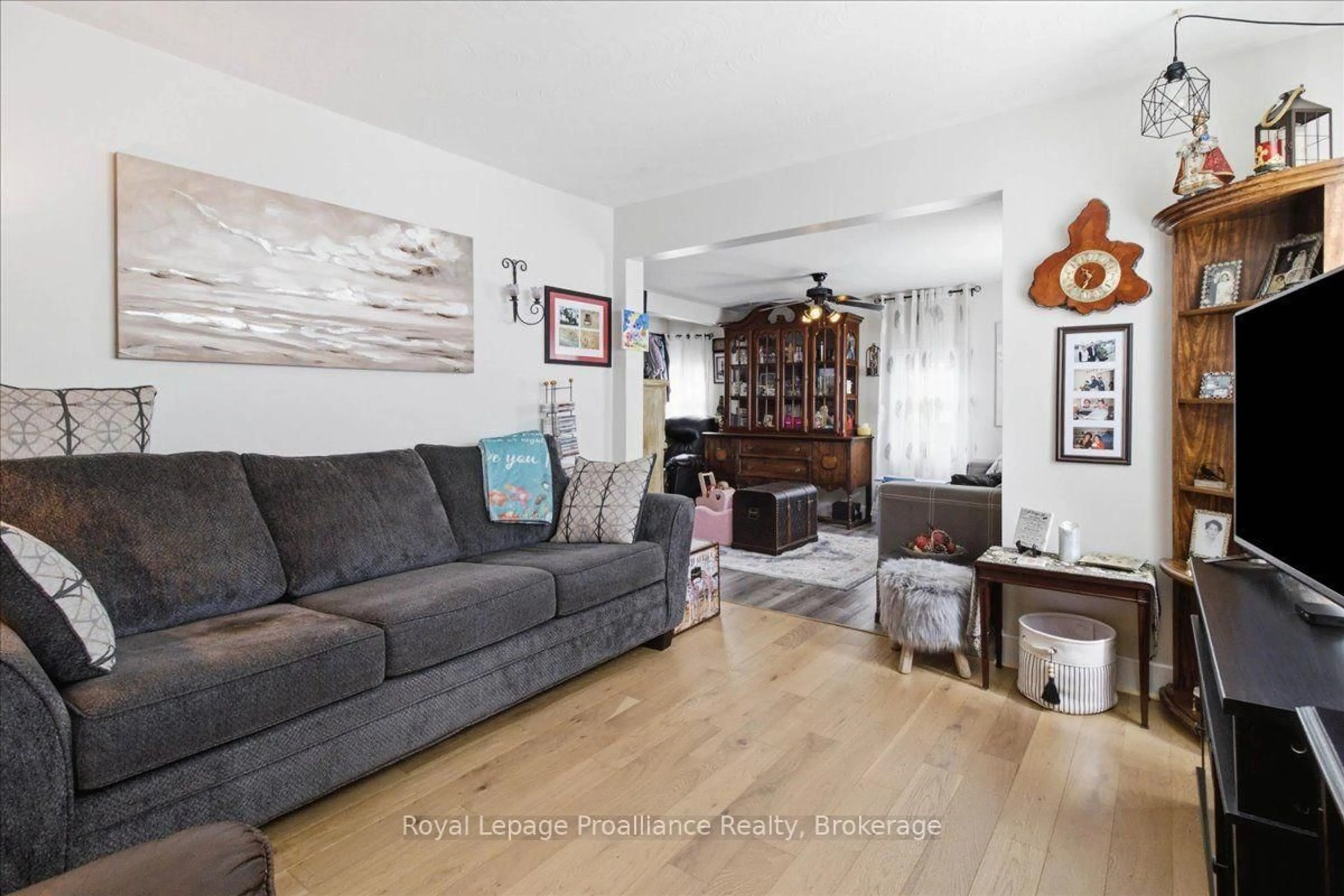 Living room with furniture, wood/laminate floor for 21 North Hastings Ave, Limoges Ontario K0K 2M0