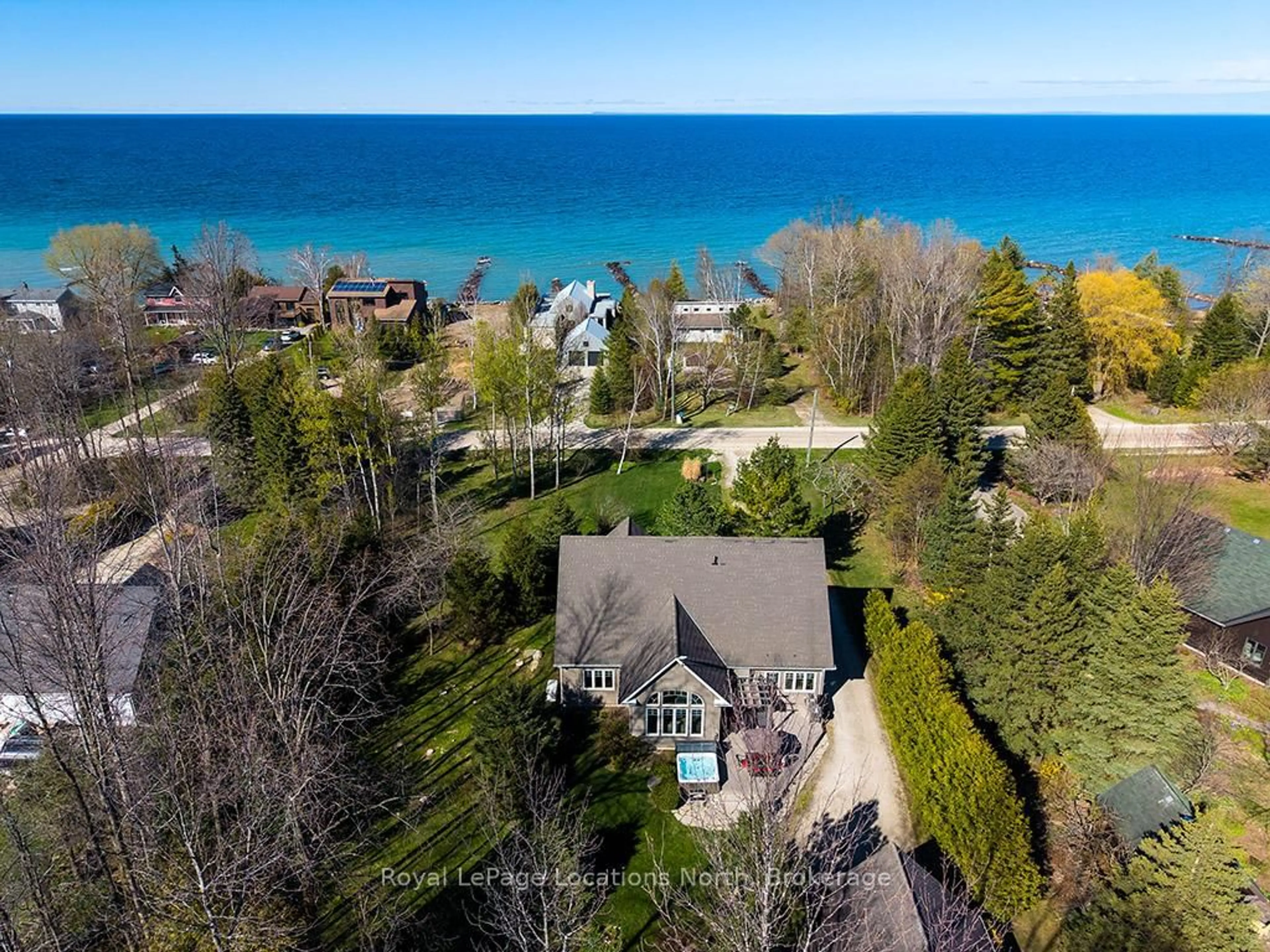 A pic from outside/outdoor area/front of a property/back of a property/a pic from drone, water/lake/river/ocean view for 166 Sunset Blvd, Blue Mountains Ontario N0H 2P0