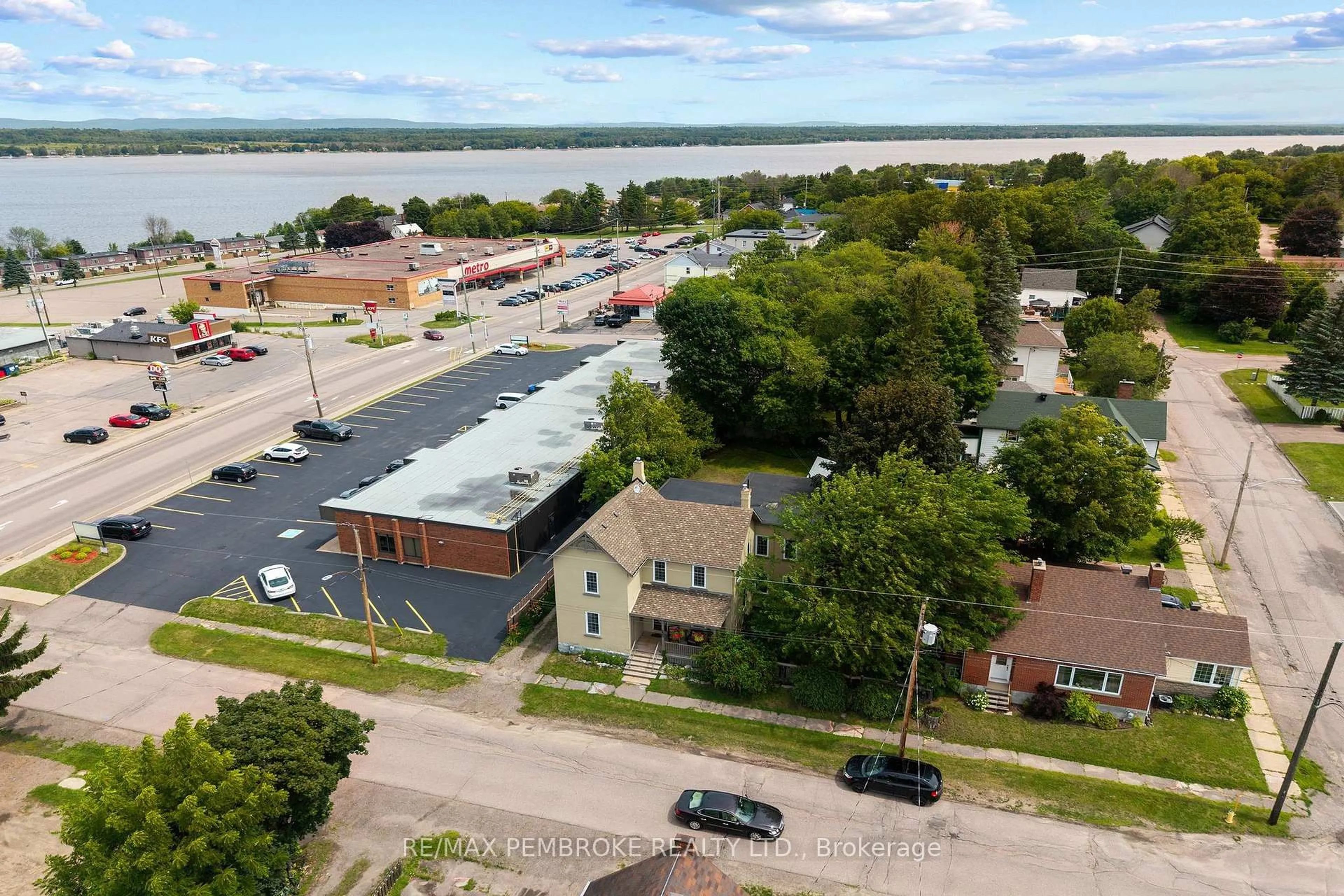 A pic from outside/outdoor area/front of a property/back of a property/a pic from drone, water/lake/river/ocean view for 233 Catherine St, Pembroke Ontario K8A 1V5