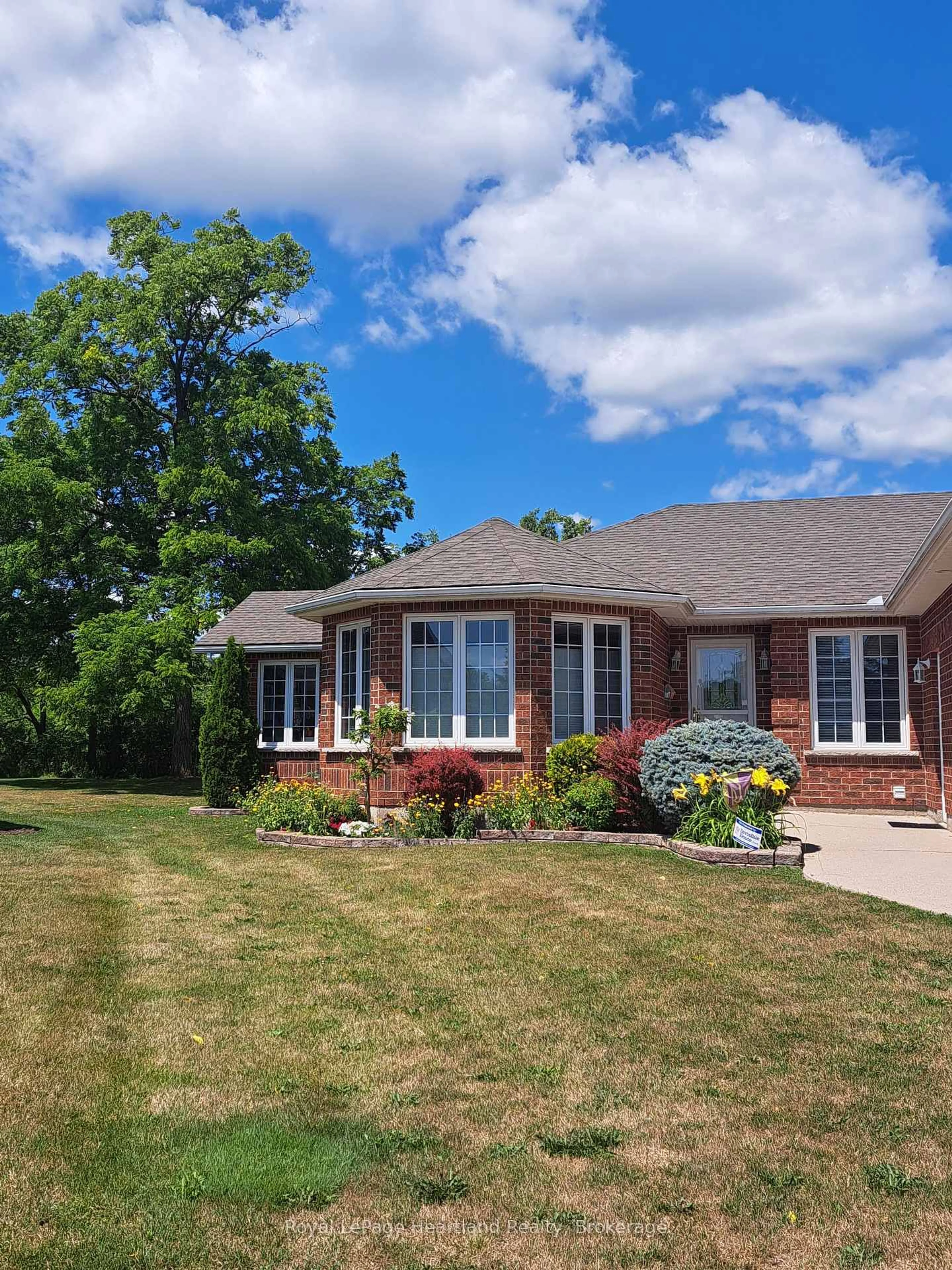 Home with brick exterior material, street for 30 Ann St #29, St. Marys Ontario N4X 1C8