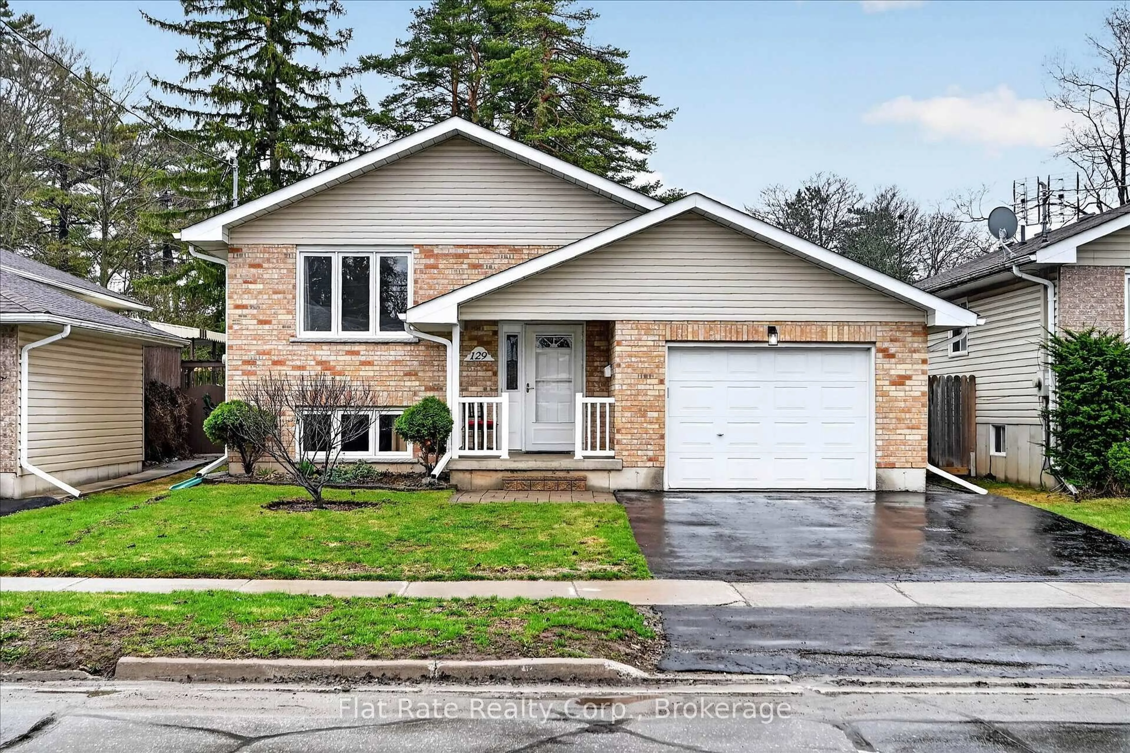 Home with brick exterior material, street for 129 Dumble Ave, Peterborough Ontario K9H 5A9