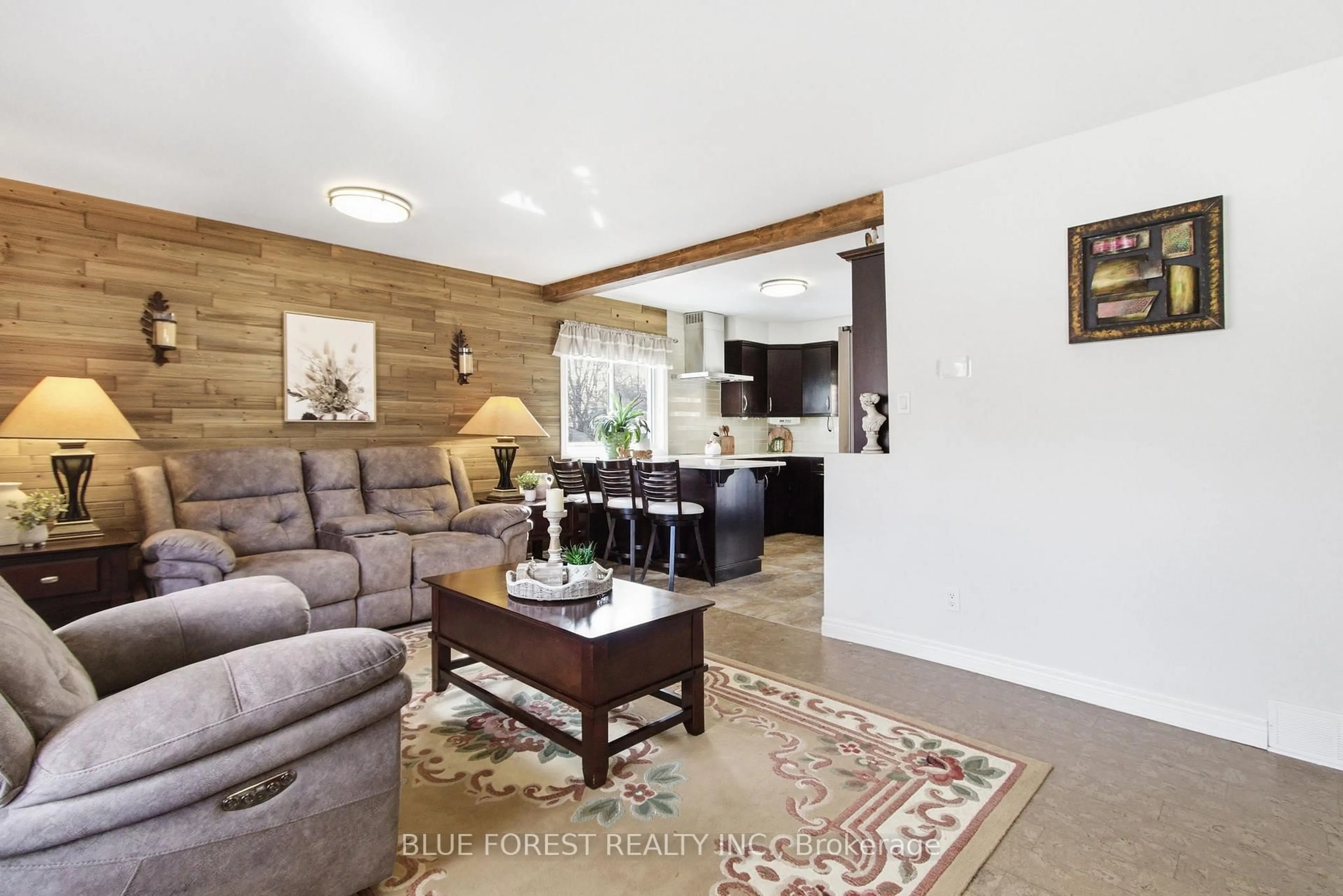 Living room with furniture, wood/laminate floor for 1975 Royal Cres, London East Ontario N5V 1N6