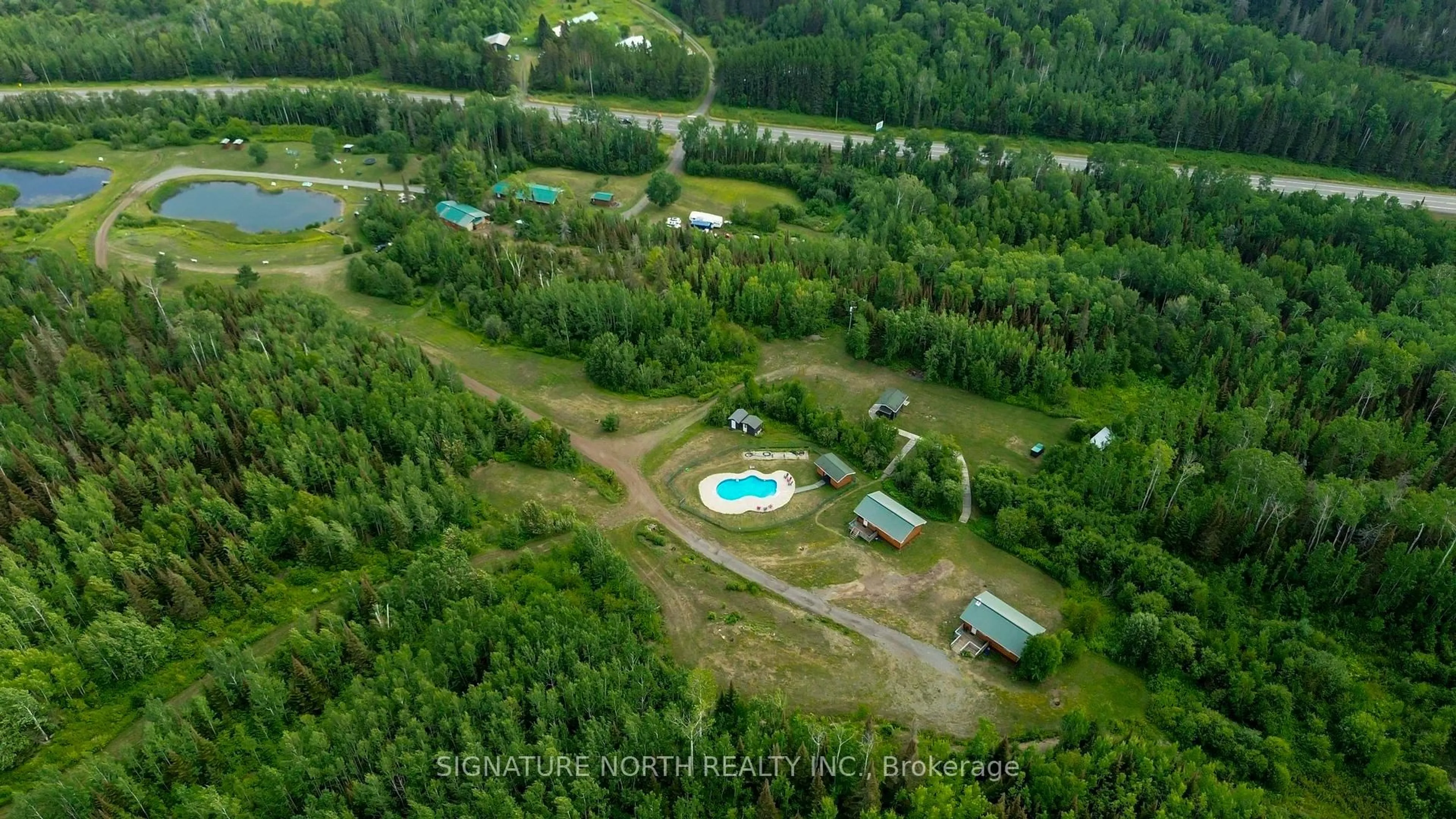 A pic from outside/outdoor area/front of a property/back of a property/a pic from drone, forest/trees view for 7081 HWY 61, Neebing Ontario P7L 0A1