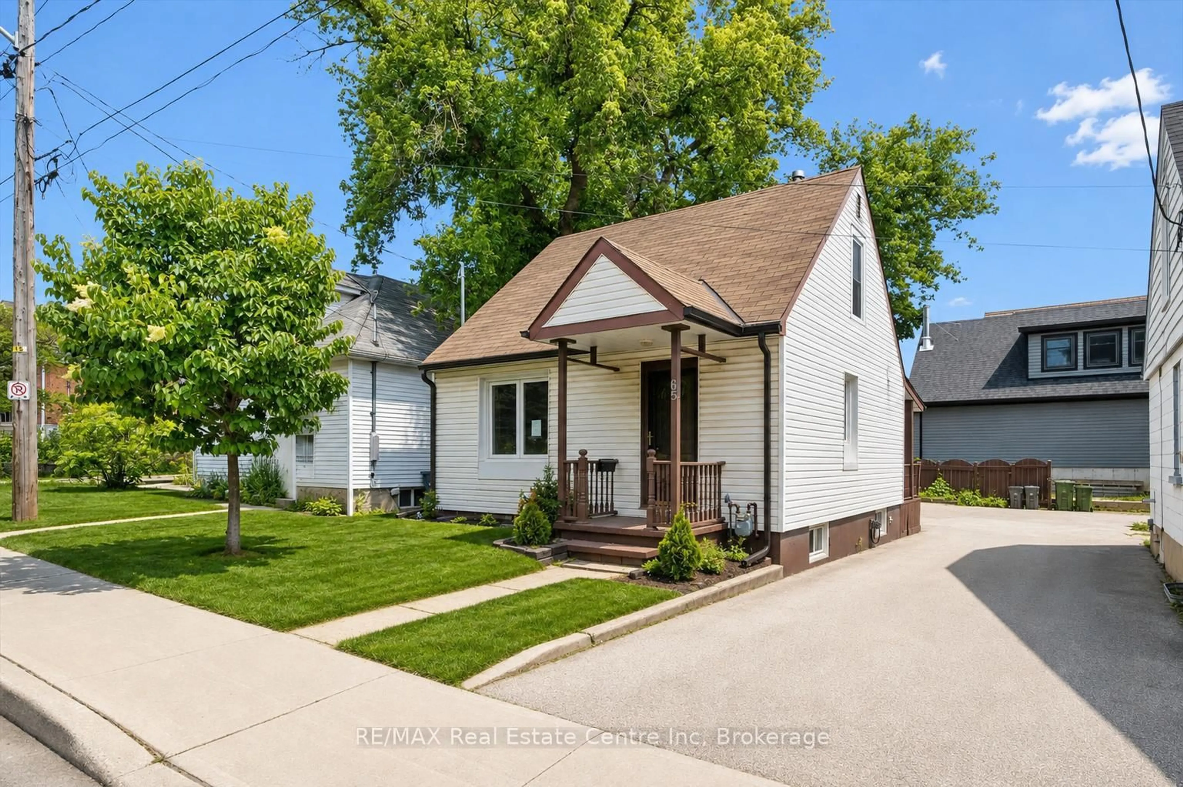 Home with vinyl exterior material, street for 65 STEVENSON St, Guelph Ontario N1E 5A6