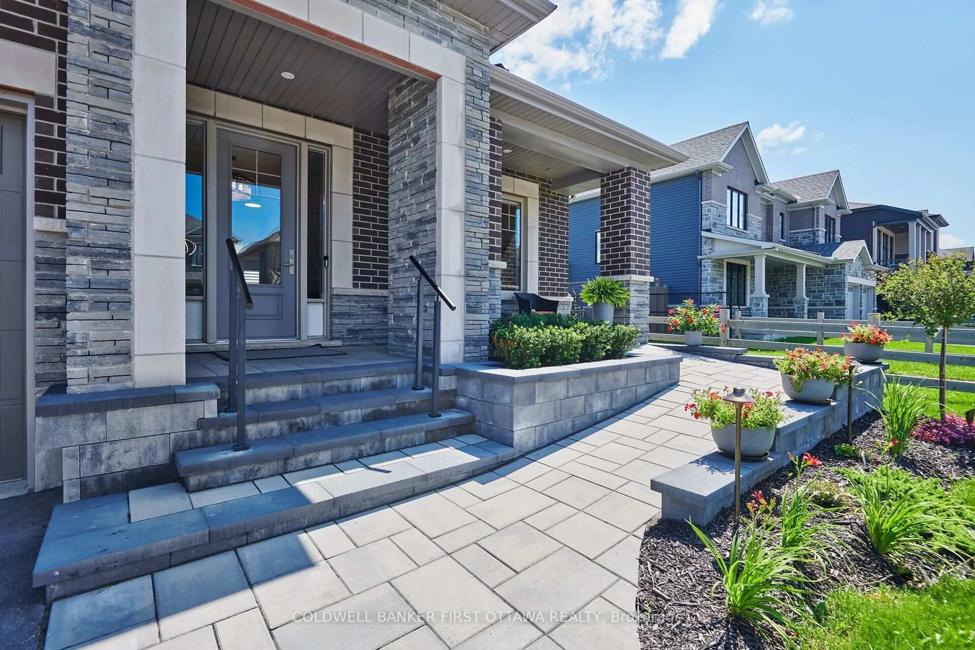 Home with brick exterior material, street for 107 Ascari Rd, Ottawa Ontario K4M 0M1
