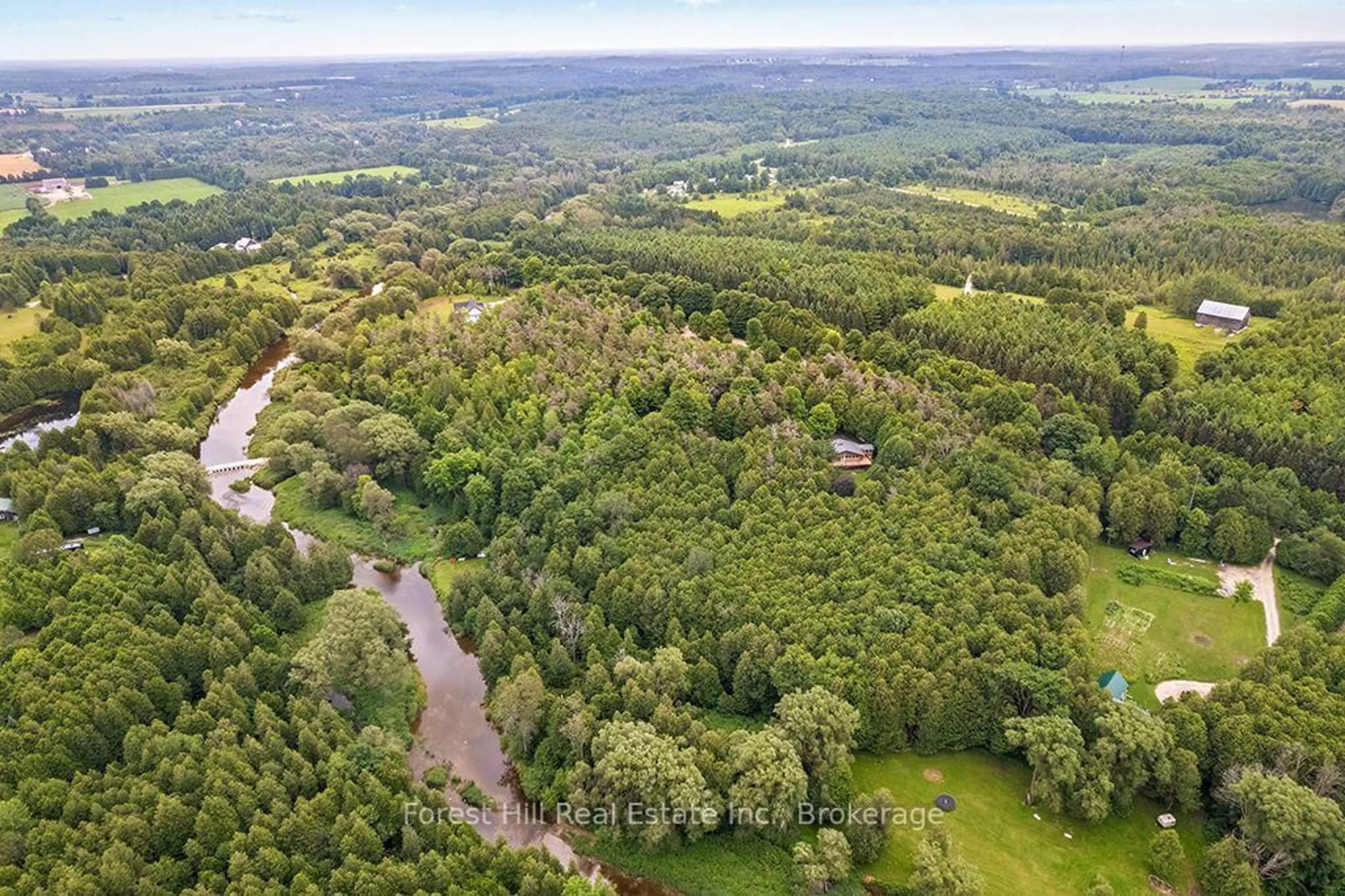 A pic from outside/outdoor area/front of a property/back of a property/a pic from drone, forest/trees view for 344511 North Line, West Grey Ontario N0C 1K0
