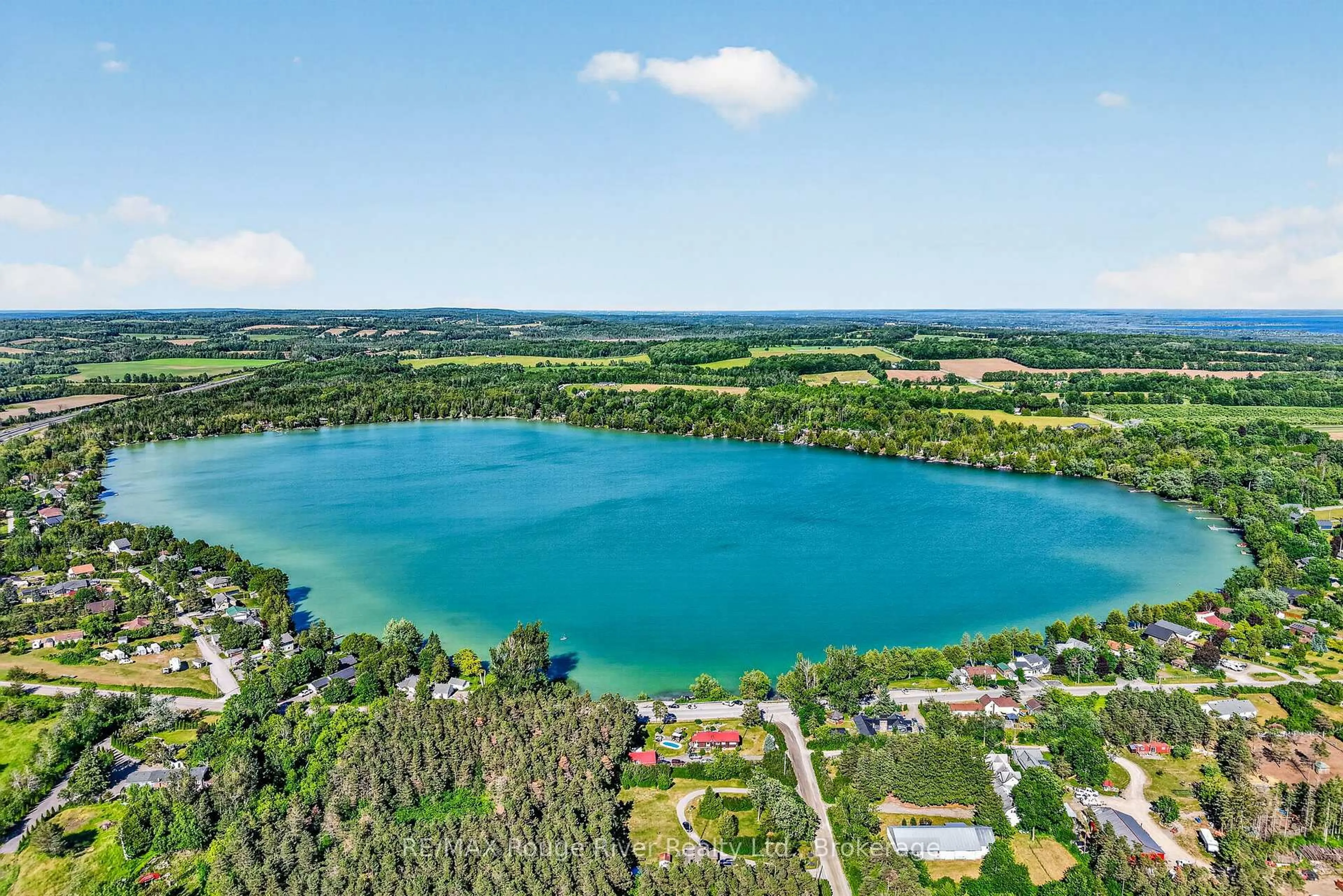 A pic from outside/outdoor area/front of a property/back of a property/a pic from drone, water/lake/river/ocean view for 149 Pine Tree Lane, Cramahe Ontario K0K 1S0
