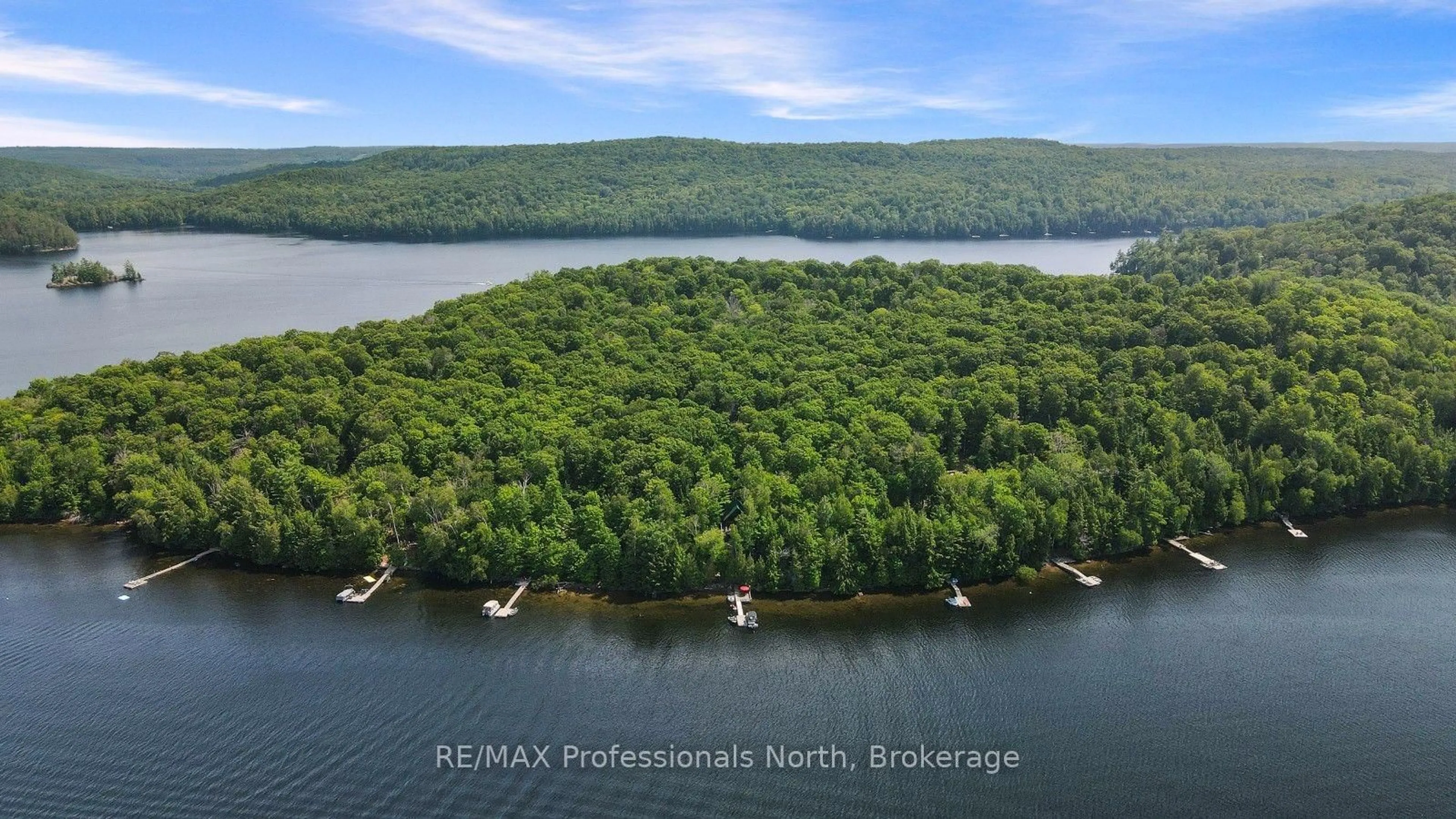A pic from outside/outdoor area/front of a property/back of a property/a pic from drone, water/lake/river/ocean view for 11230 Hunters (WAO) Island, Dysart et al Ontario K0M 1S0