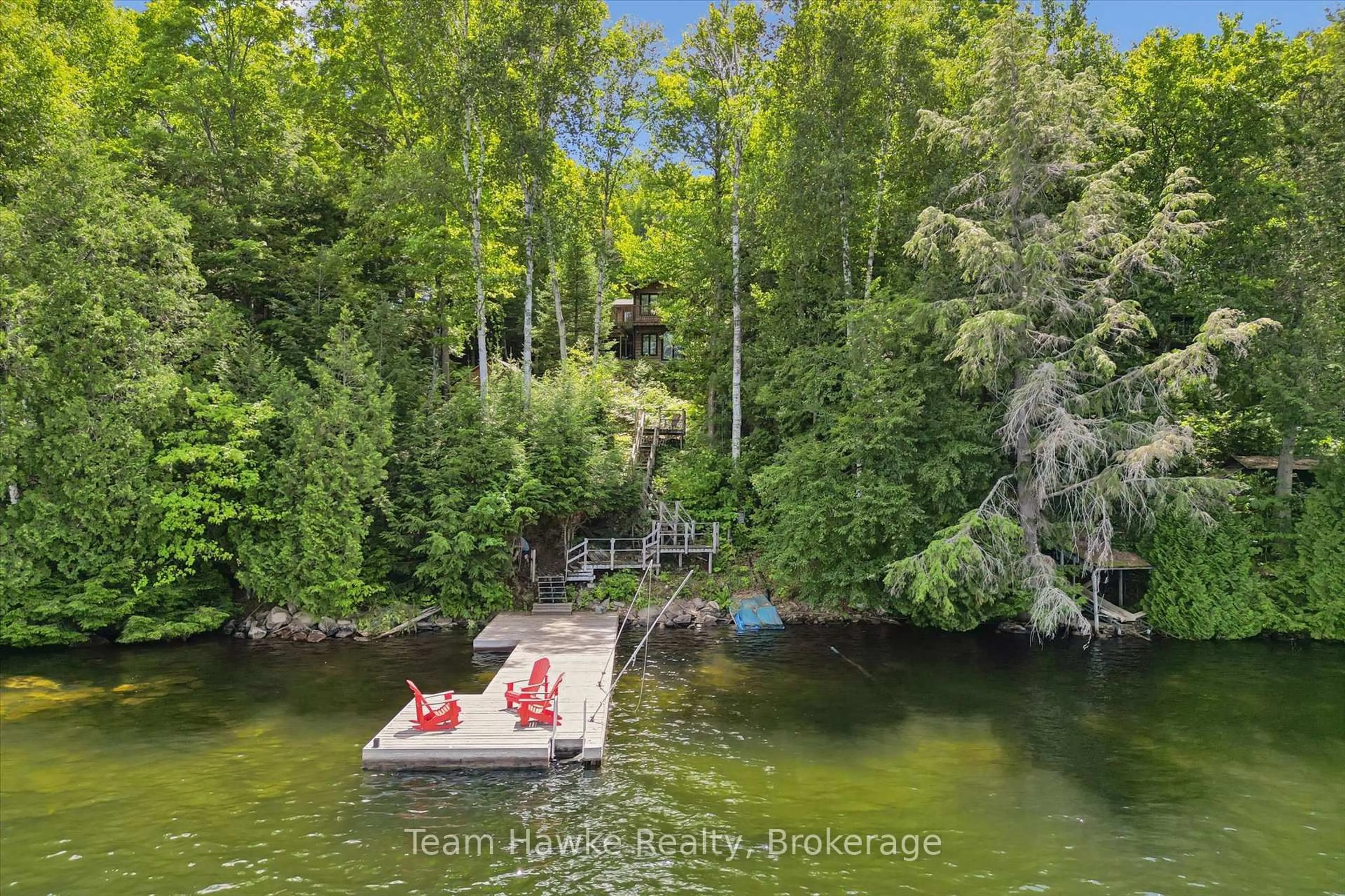 A pic from outside/outdoor area/front of a property/back of a property/a pic from drone, water/lake/river/ocean view for 3359 Maple Ridge Rd, Algonquin Highlands Ontario P0A 1E0