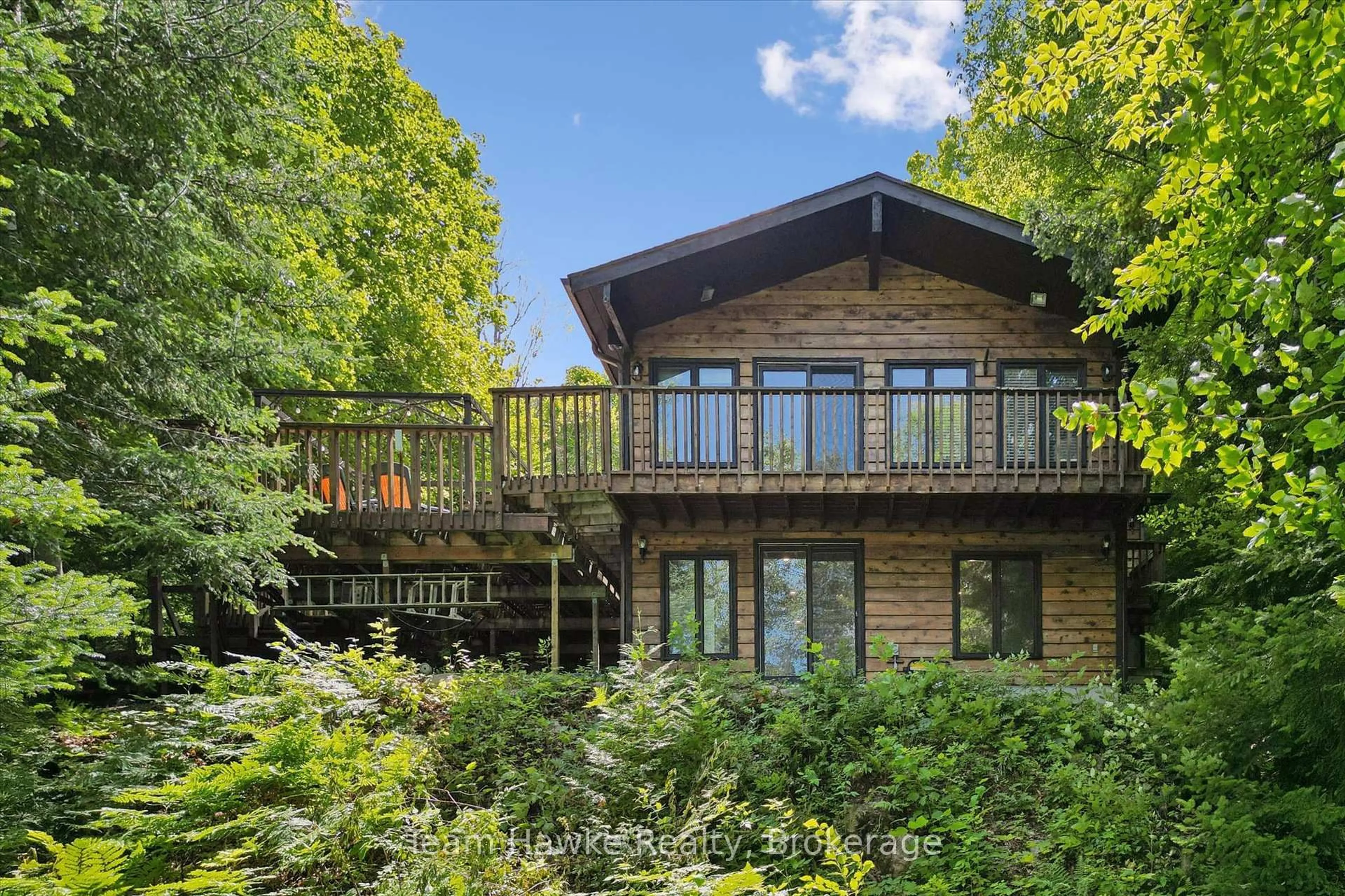 Home with brick exterior material, water/lake/river/ocean view for 3359 Maple Ridge Rd, Algonquin Highlands Ontario P0A 1E0