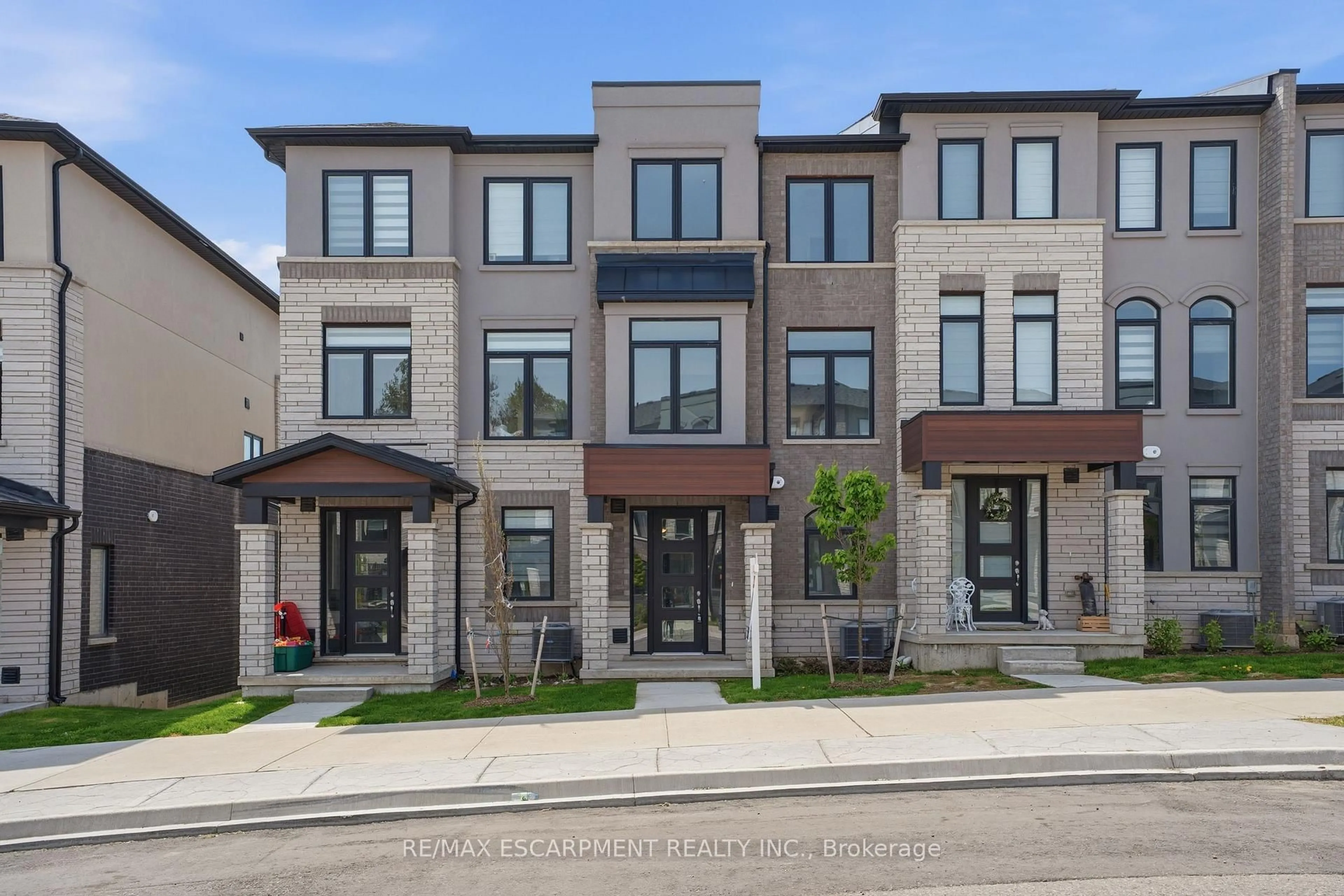 Home with brick exterior material, street for 155 Equestrian Way #33, Cambridge Ontario N3E 0E8