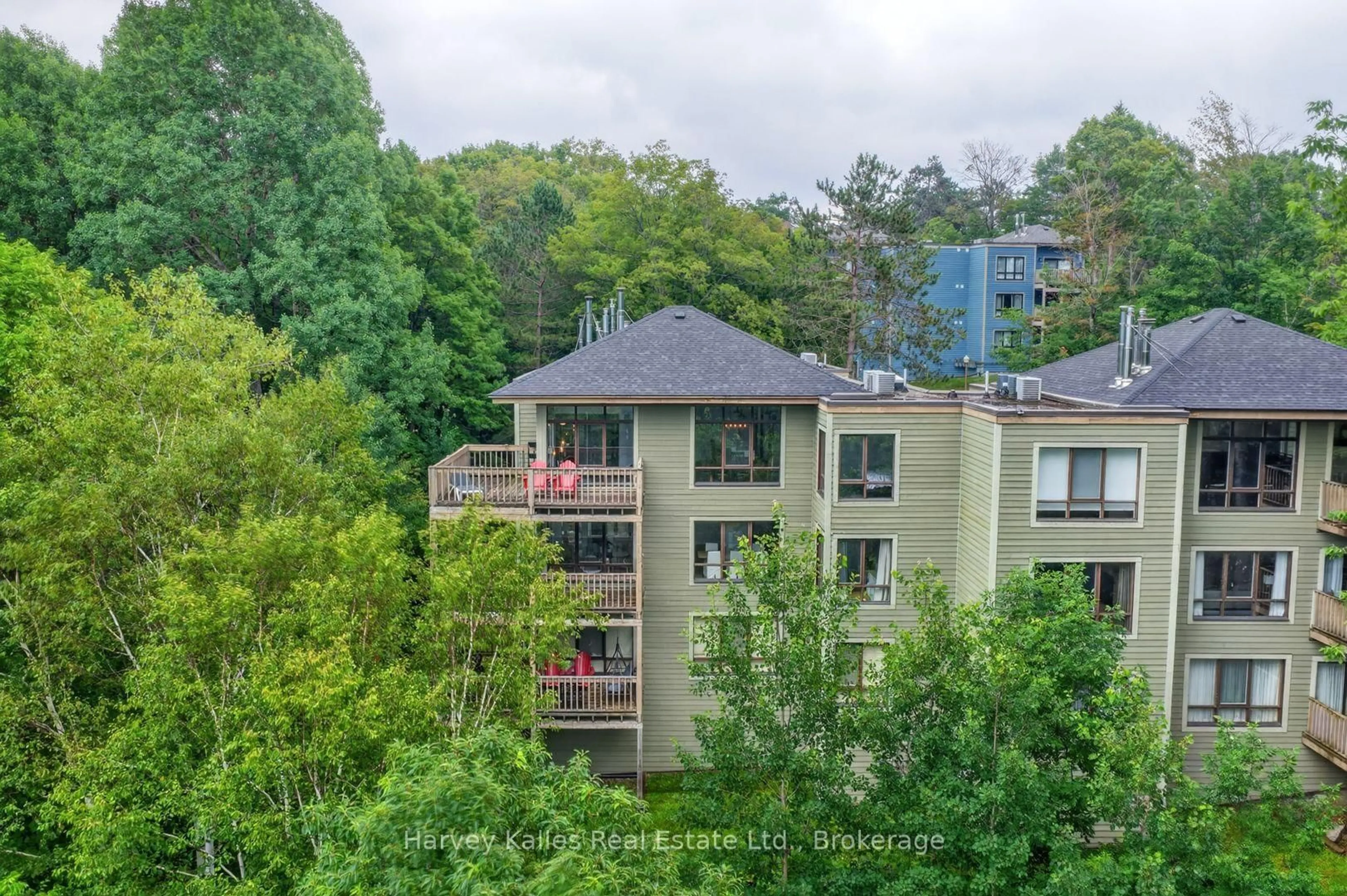 A pic from outside/outdoor area/front of a property/back of a property/a pic from drone, city buildings view from balcony for 26 Deerhurst Golfview Dr #303, Huntsville Ontario P1H 1A9
