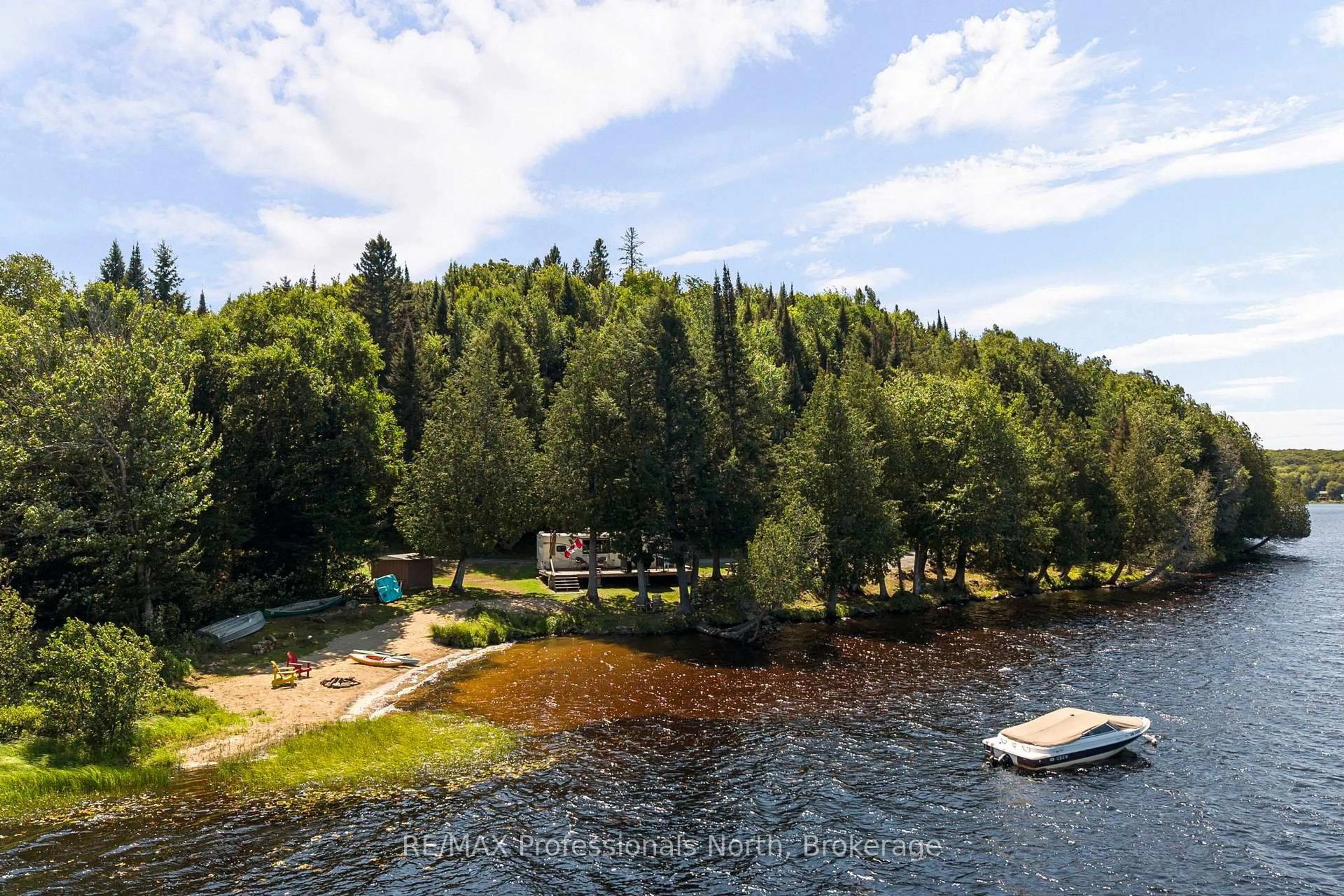 A pic from outside/outdoor area/front of a property/back of a property/a pic from drone, water/lake/river/ocean view for 1516 Deer Lake Rd, Perry Ontario P0A 1J0