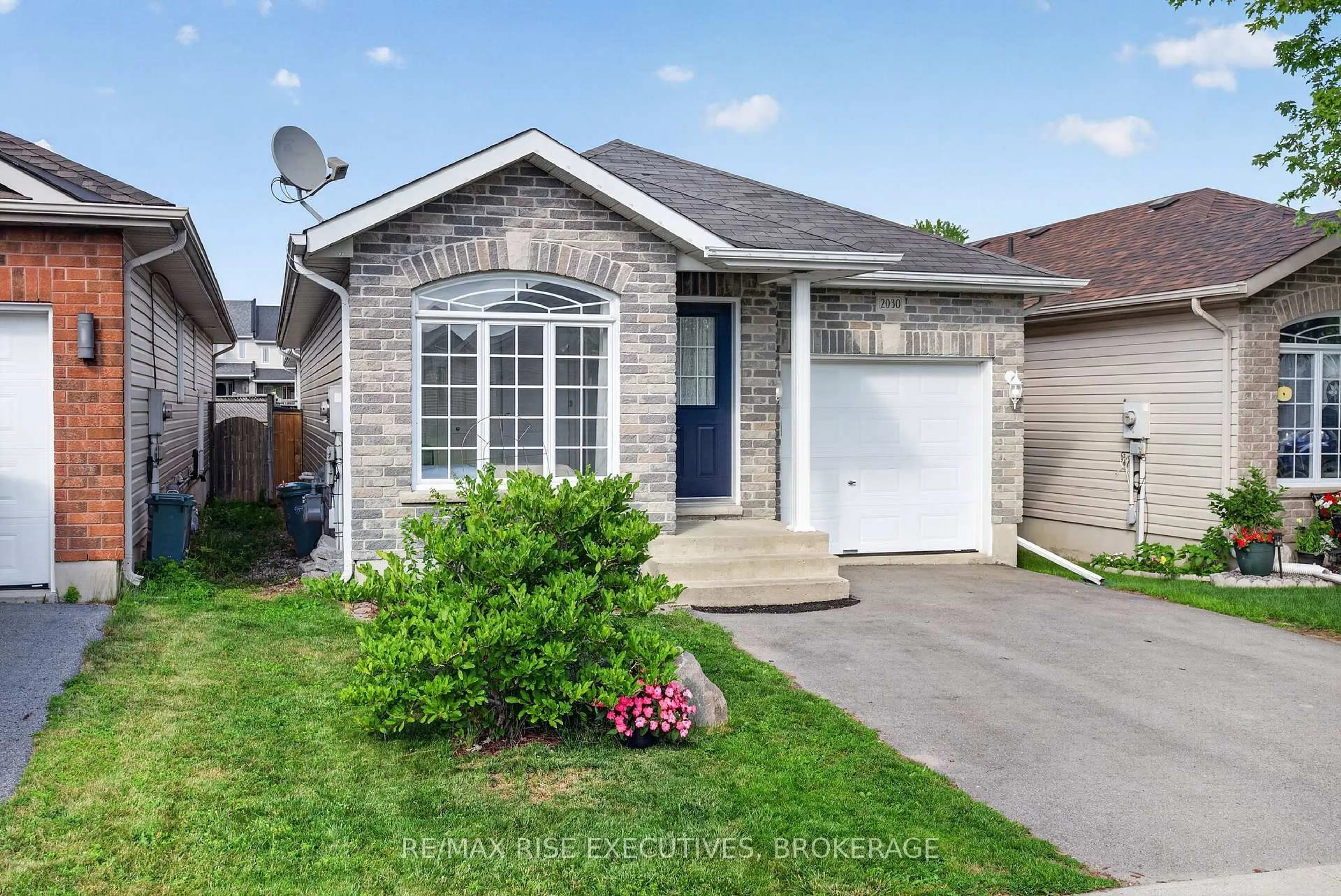 Home with brick exterior material, street for 2030 Swanfield St, Kingston Ontario K7M 0A7
