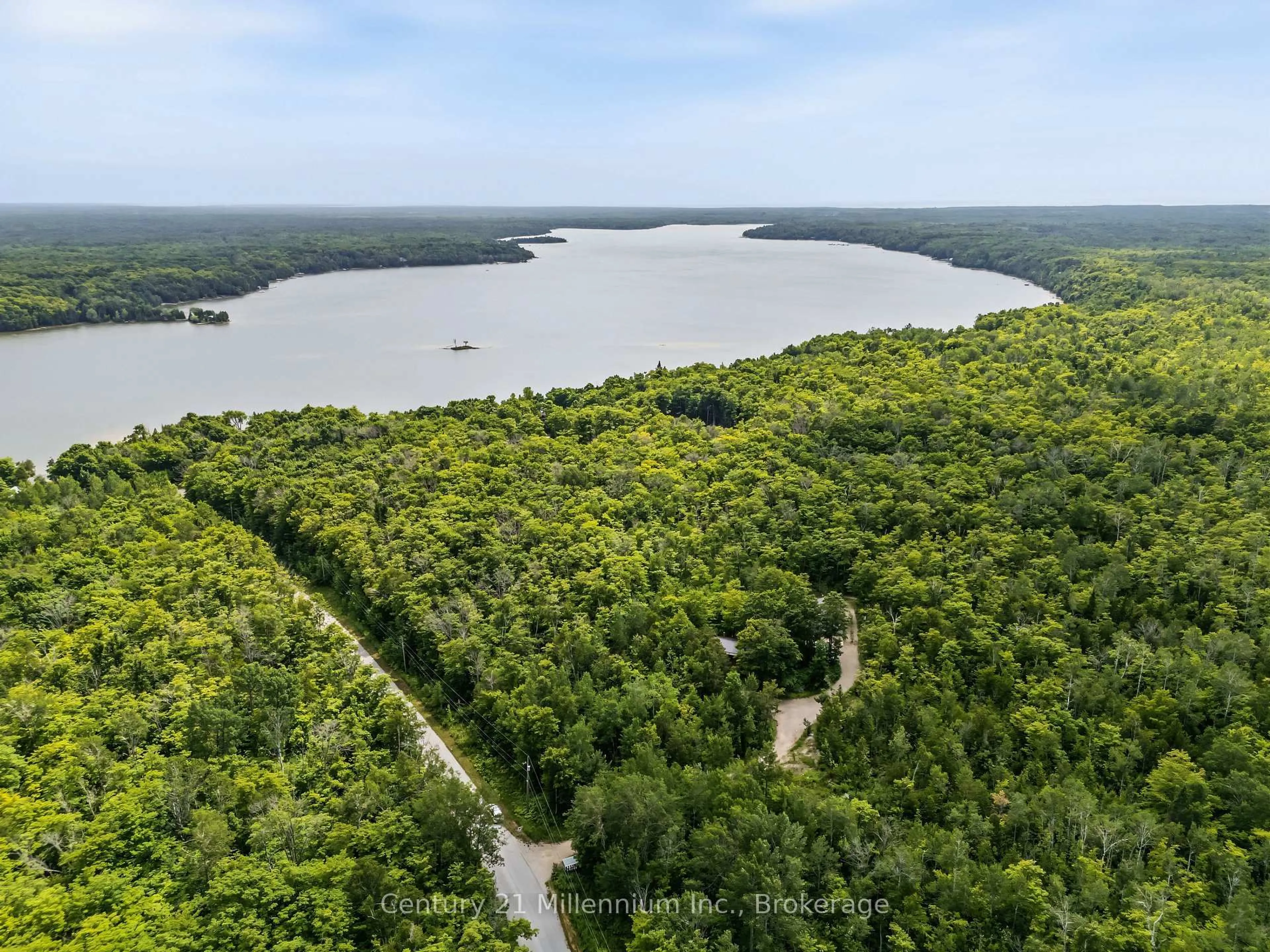 A pic from outside/outdoor area/front of a property/back of a property/a pic from drone, water/lake/river/ocean view for 29 Barnett's Dr, Northern Bruce Peninsula Ontario N0H 1Z0