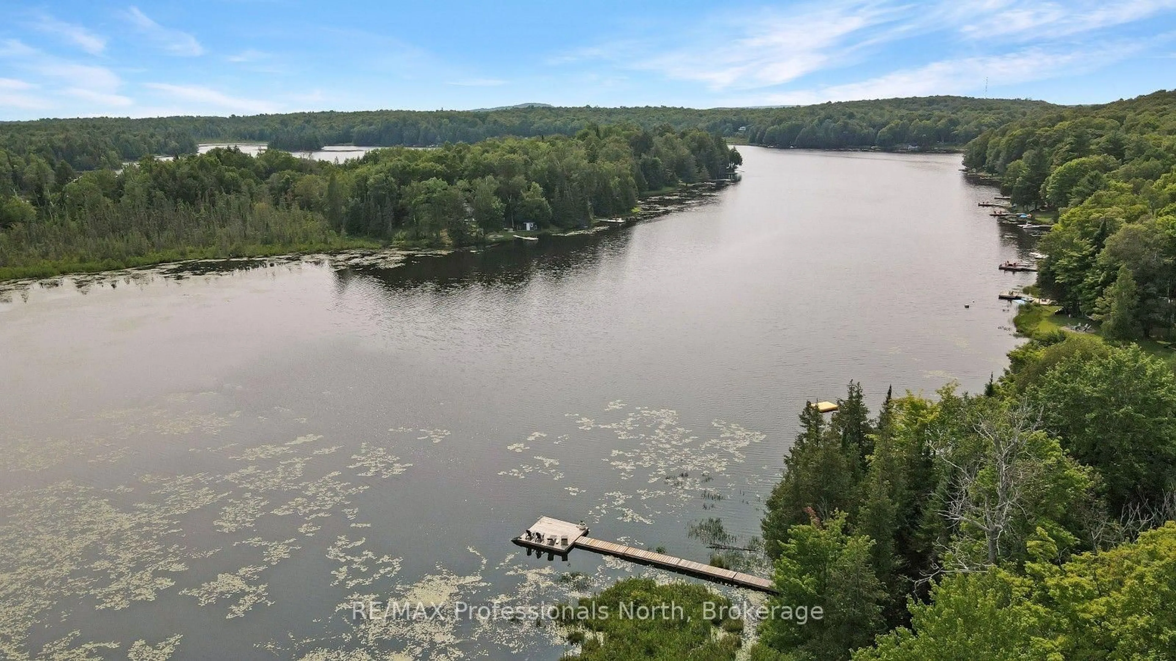 A pic from outside/outdoor area/front of a property/back of a property/a pic from drone, water/lake/river/ocean view for 1027 Trooper Lake Dr, Highlands East Ontario K0M 1R0