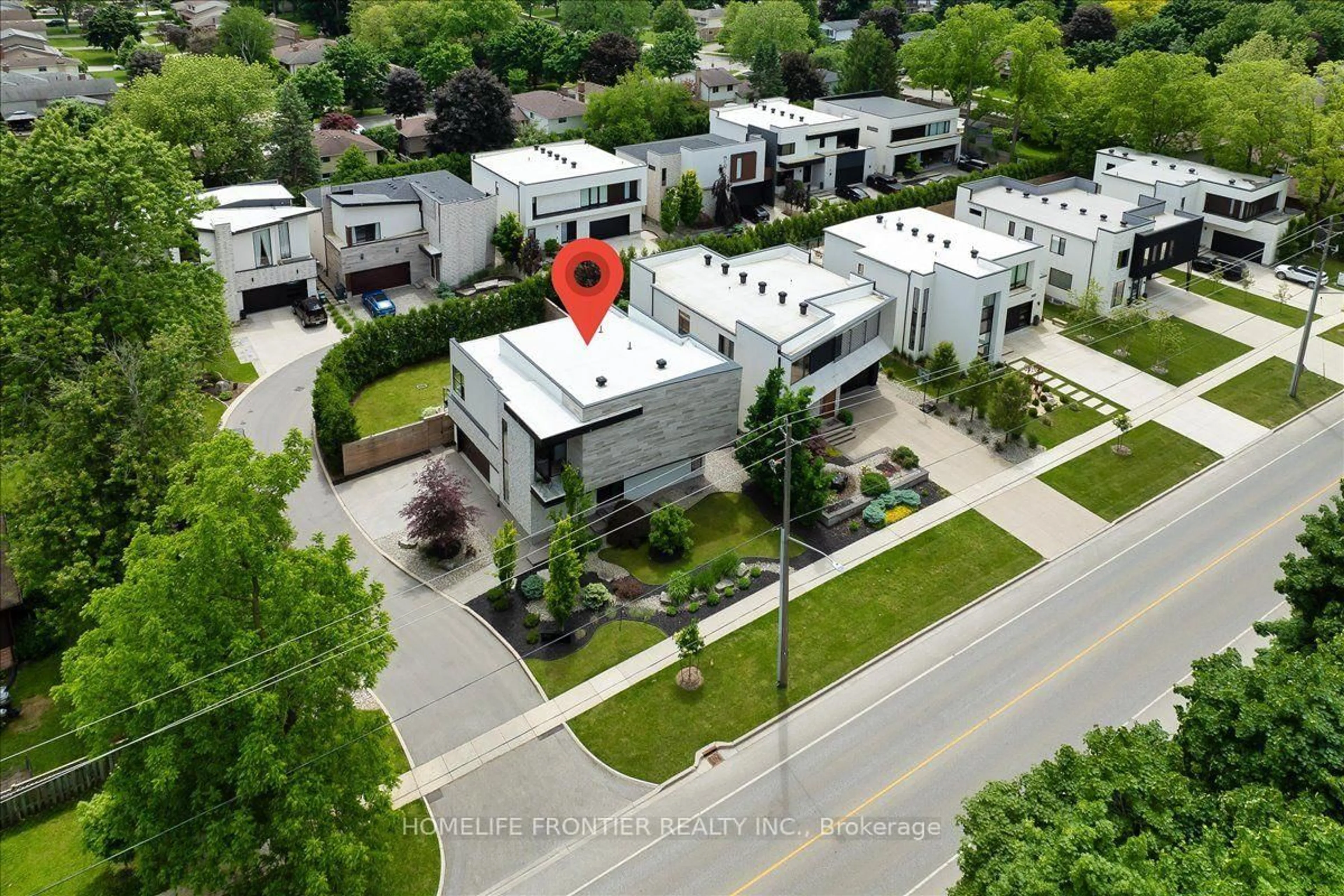 A pic from outside/outdoor area/front of a property/back of a property/a pic from drone, street for 1452 Byron Baseline Rd #1, London South Ontario N6K 2V6