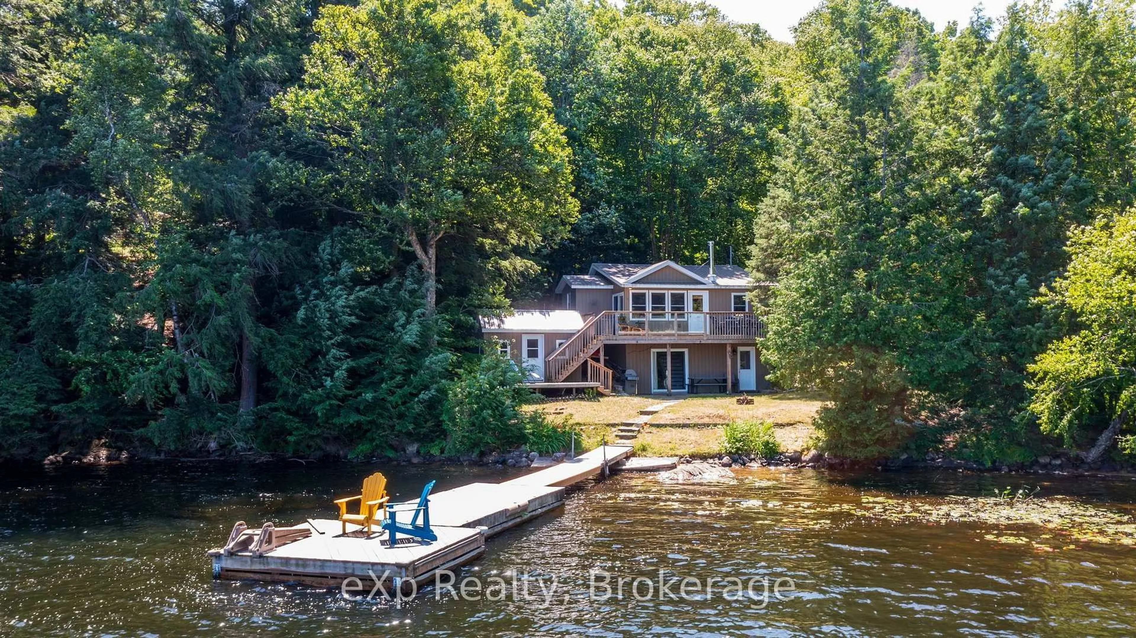 A pic from outside/outdoor area/front of a property/back of a property/a pic from drone, water/lake/river/ocean view for 31 Loon Echo Tr, Seguin Ontario P2A 2W8