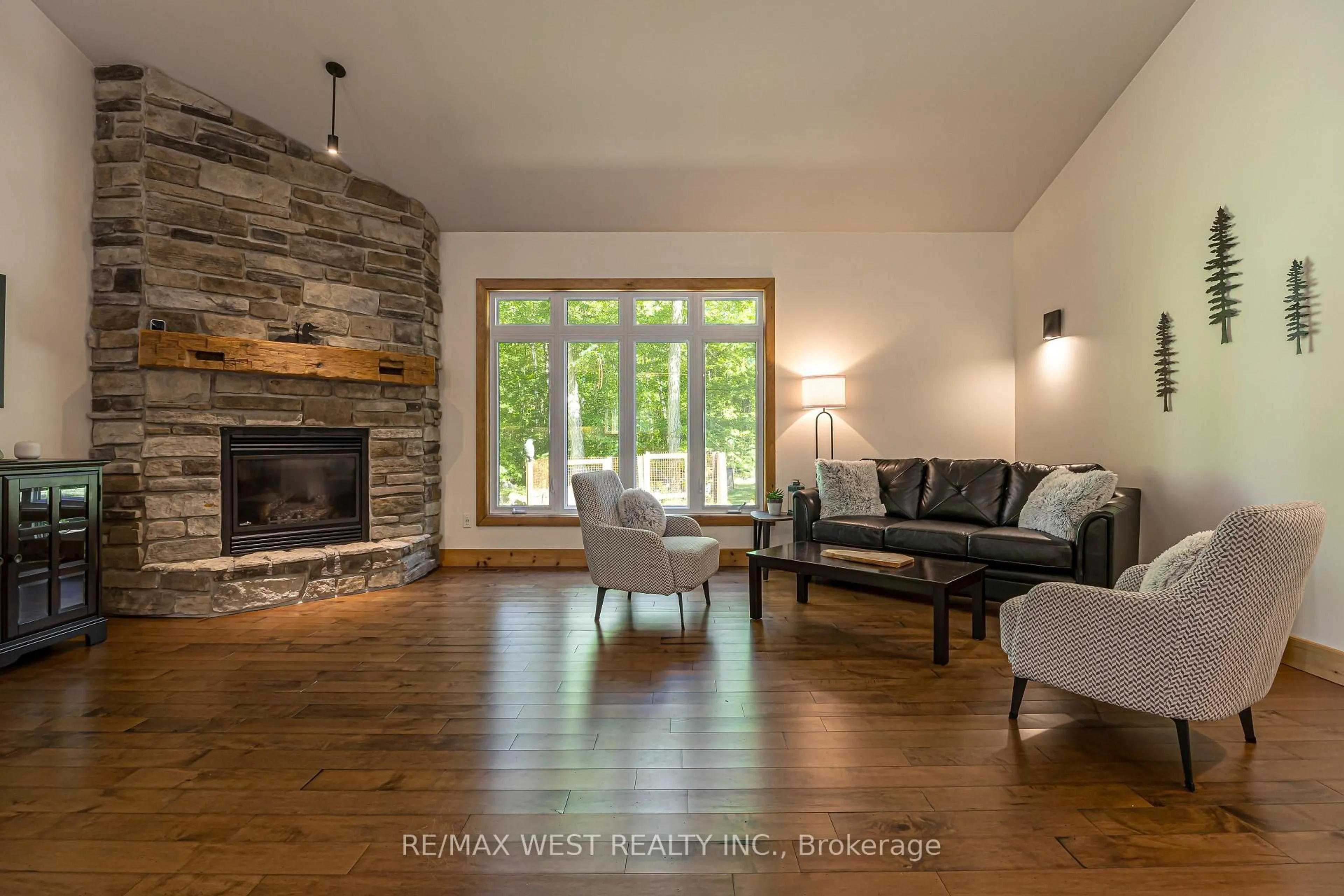 Living room with furniture, wood/laminate floor for 215 Flatrock Rd, Belleville Ontario K0K 2Y0