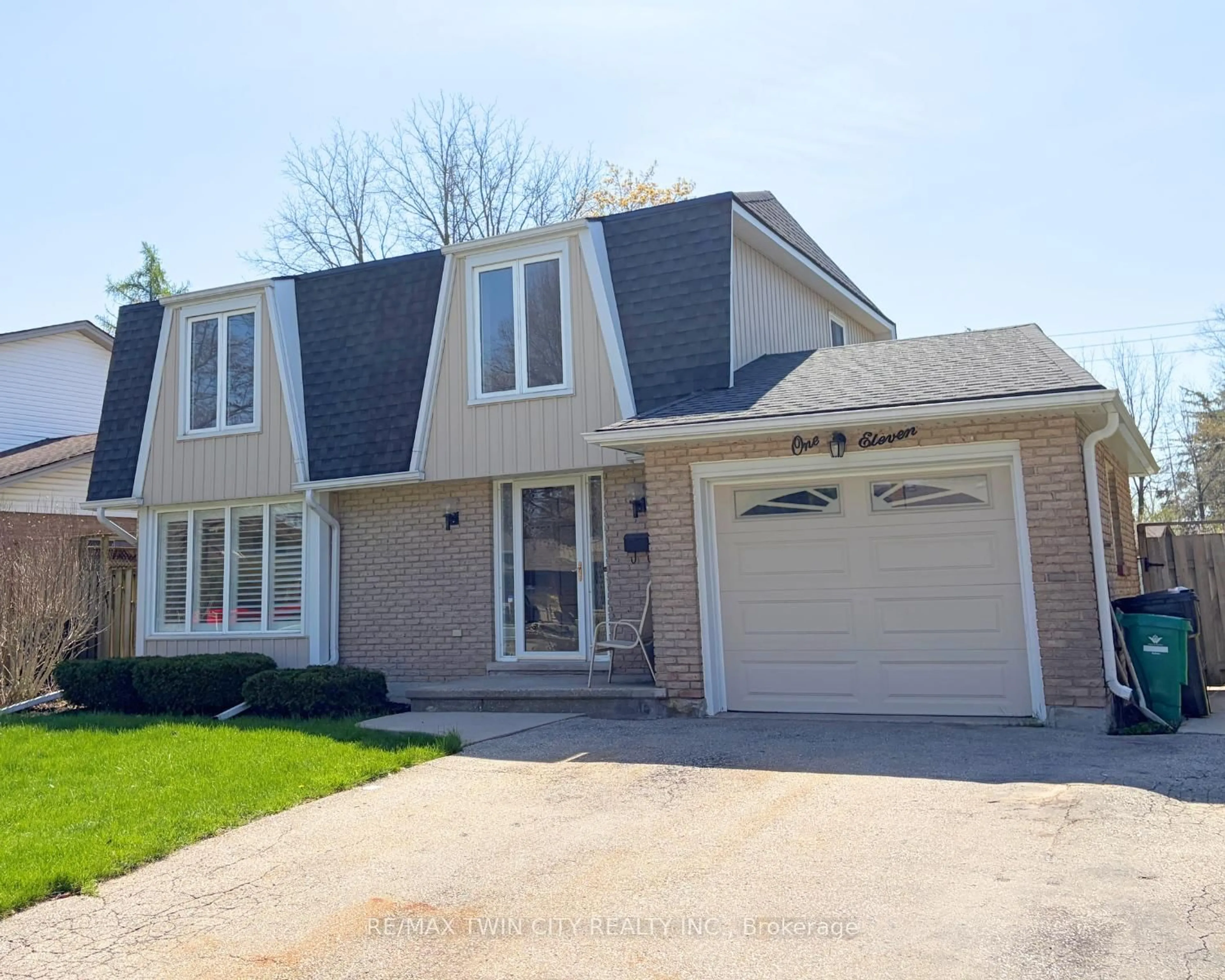 Home with vinyl exterior material, street for 111 Manor Dr, Kitchener Ontario N2A 2T9
