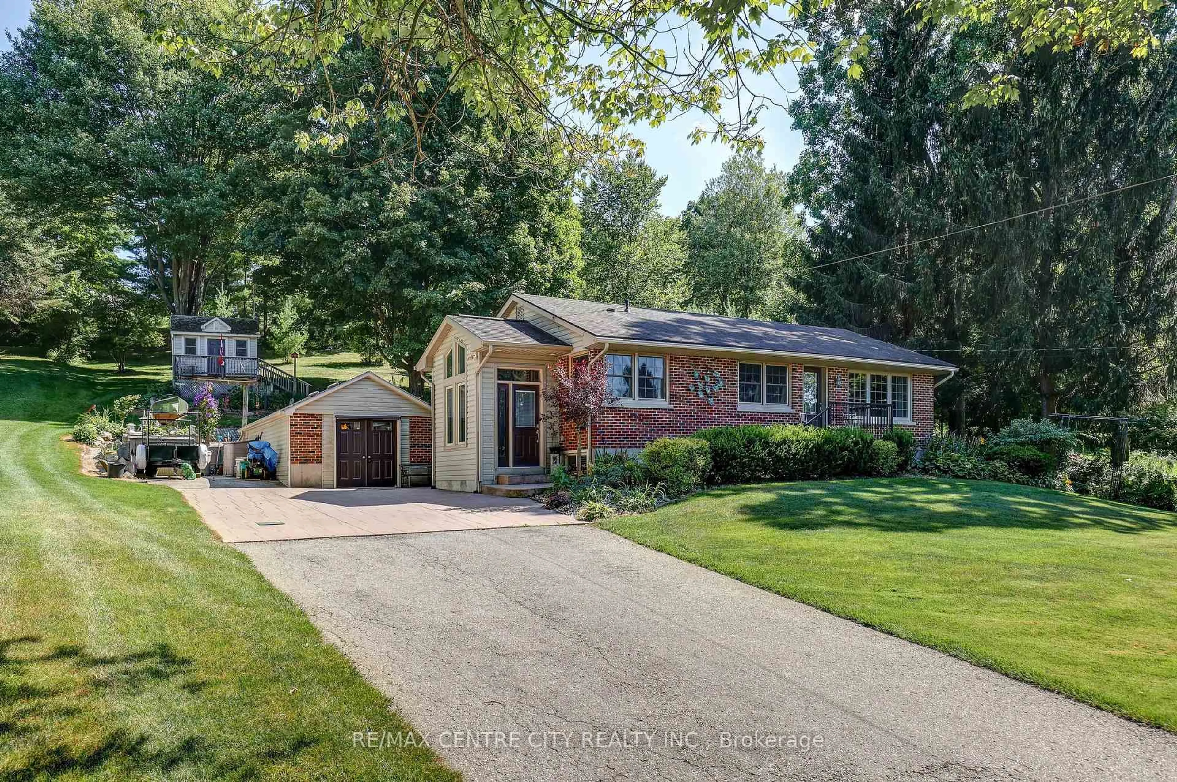Home with brick exterior material, street for 4766 SUNSET Rd, Central Elgin Ontario N5L 1J1
