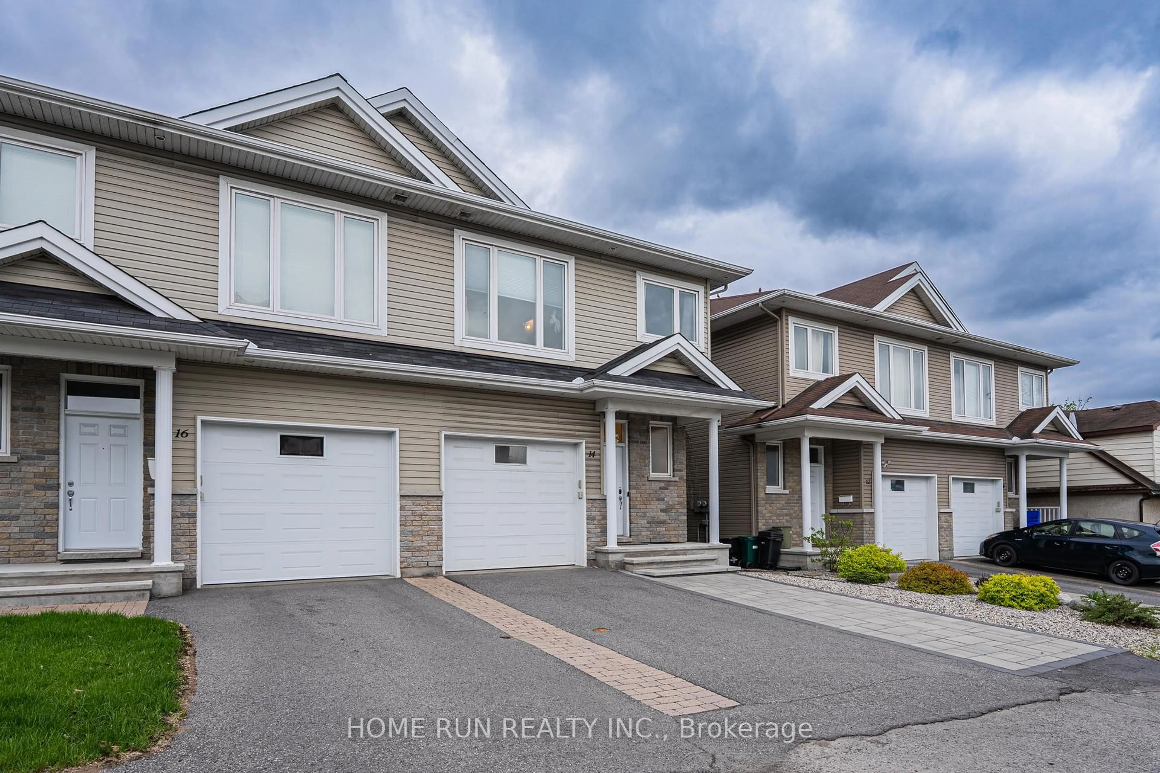 Home with vinyl exterior material, street for 14 CAMIL St, Ottawa Ontario K1K 0X1