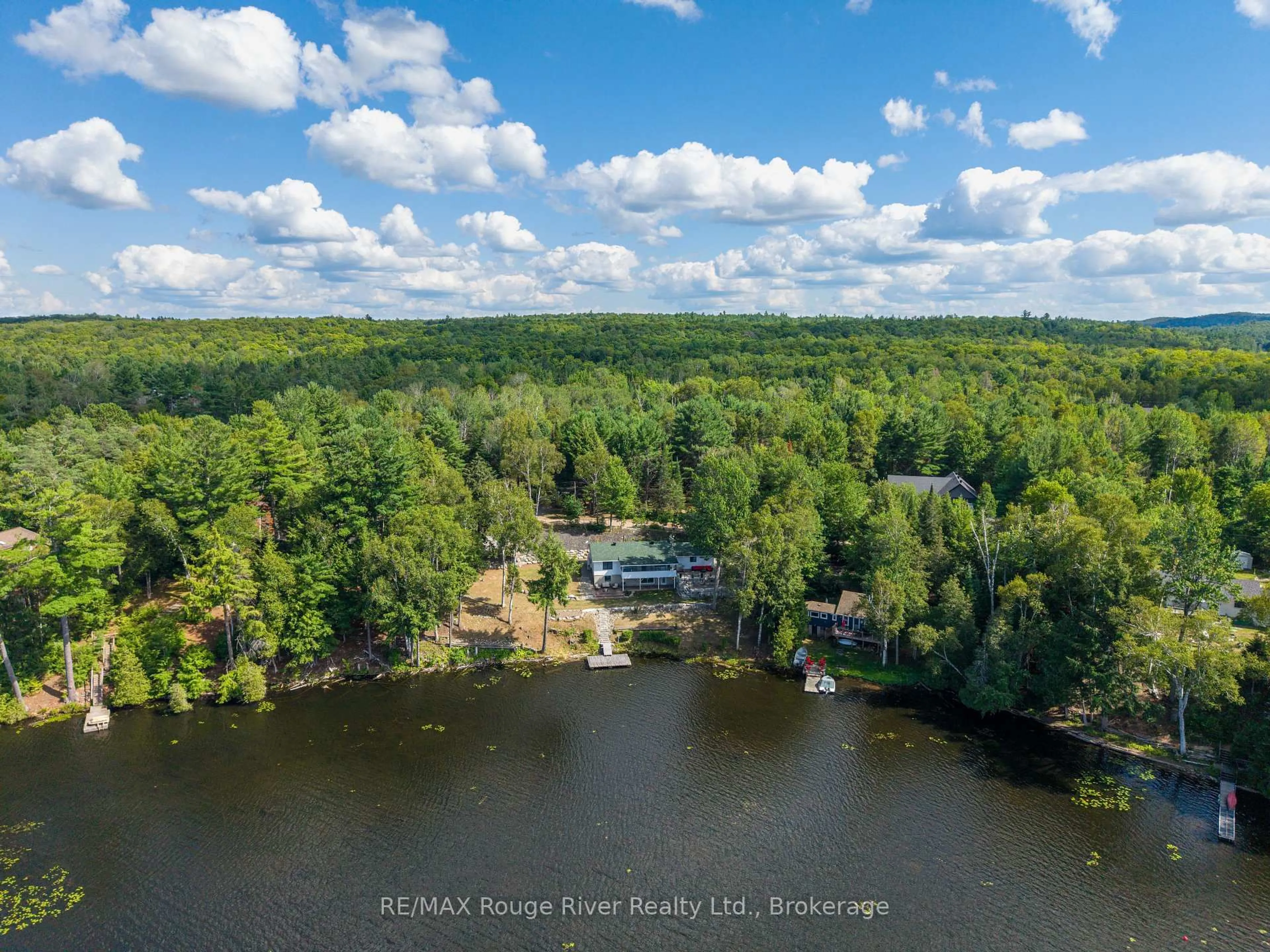 A pic from outside/outdoor area/front of a property/back of a property/a pic from drone, water/lake/river/ocean view for 1087 Lagoon Rd, Highlands East Ontario K0L 1C0