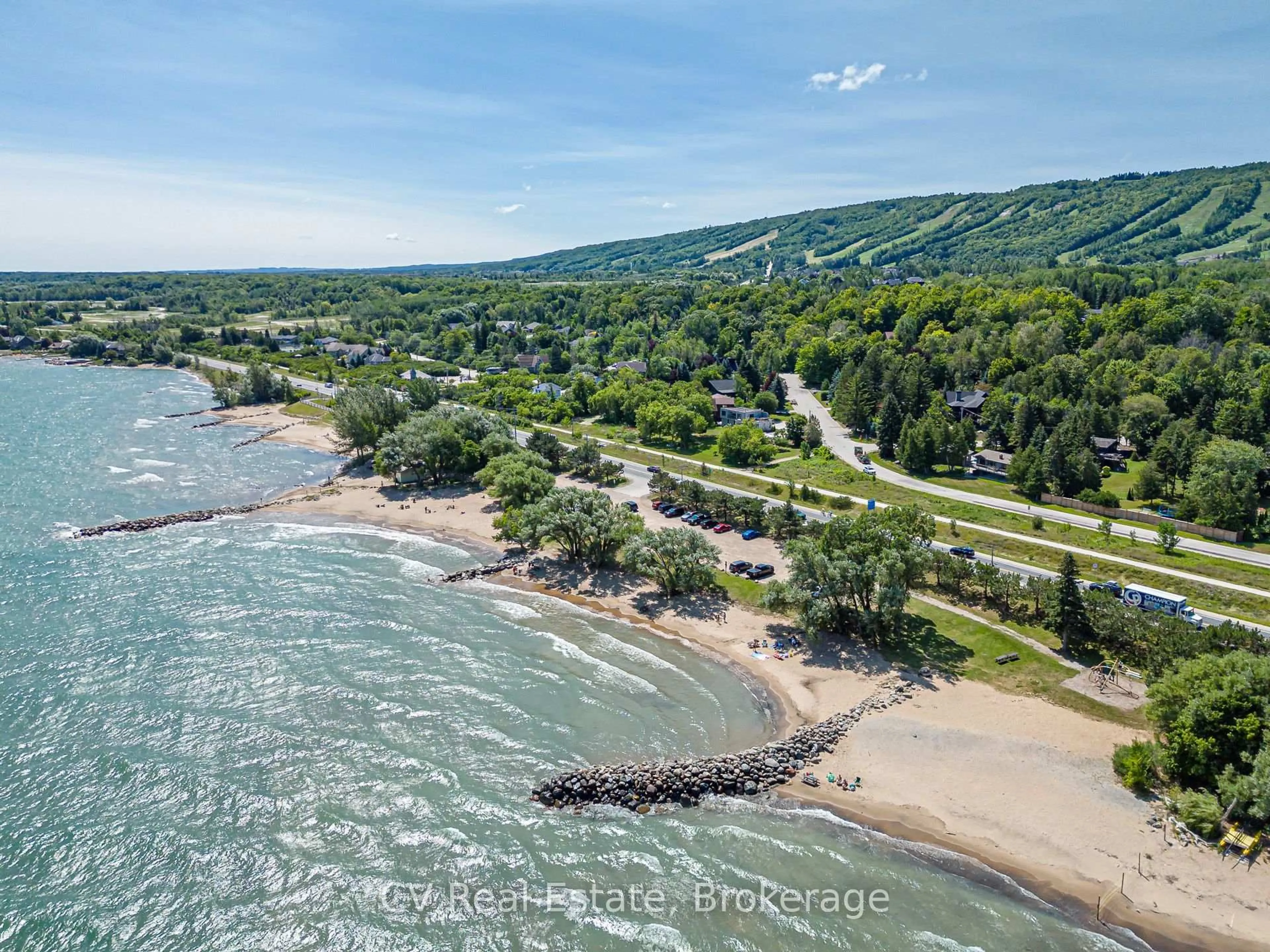 A pic from outside/outdoor area/front of a property/back of a property/a pic from drone, water/lake/river/ocean view for 156 Chamonix Cres, Blue Mountains Ontario L9Y 0S7